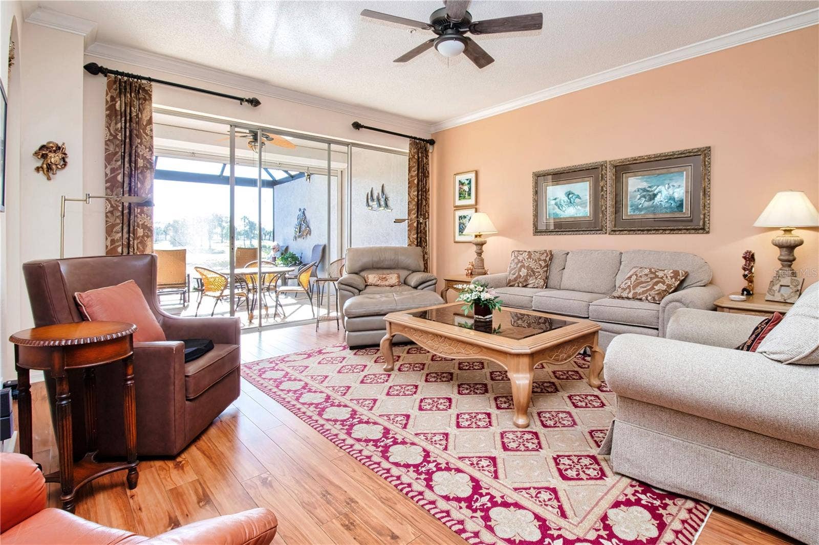 Living Room seating area, wood floors living room, dining area and den.