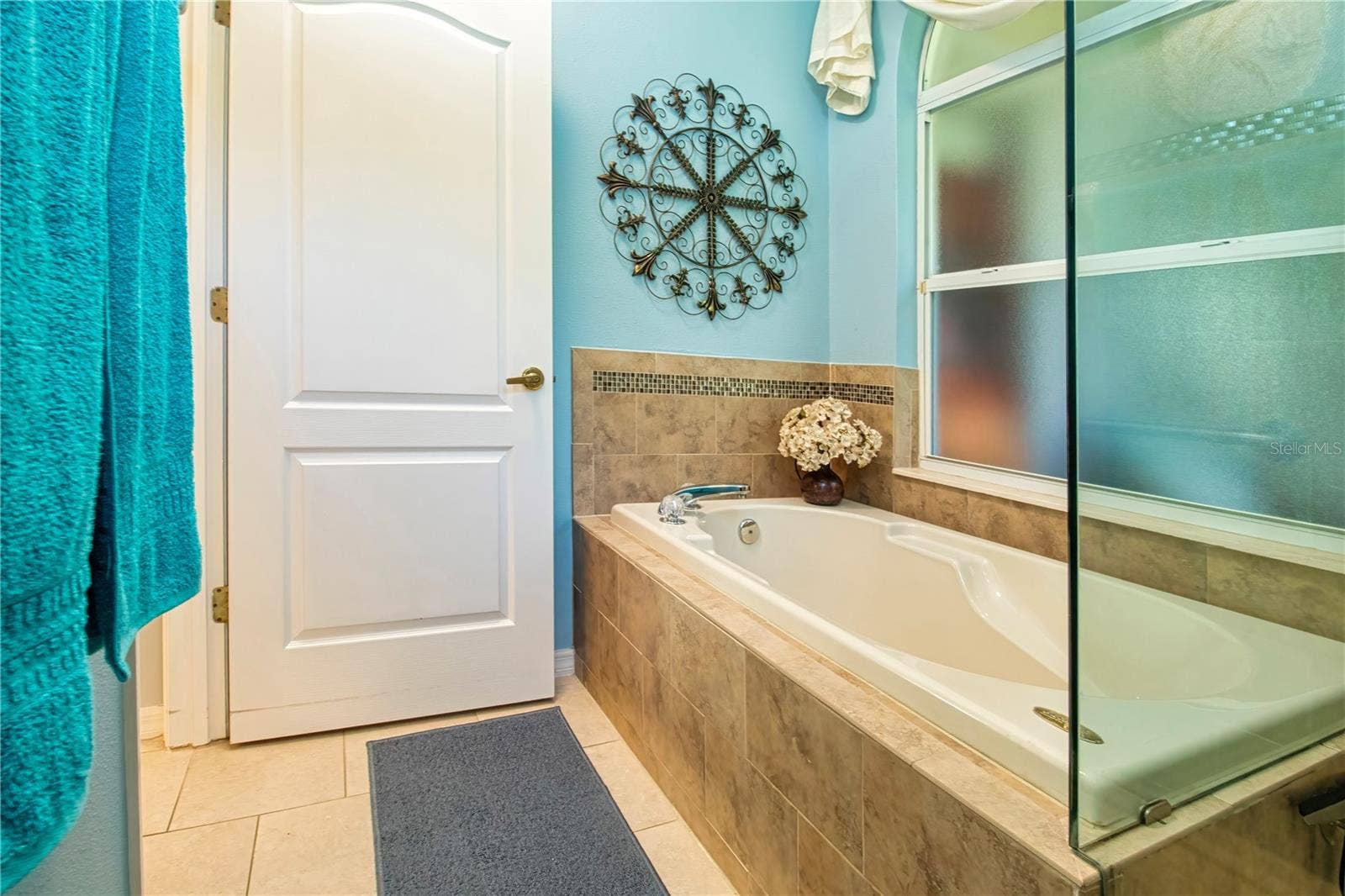 Tub, enclosed shower