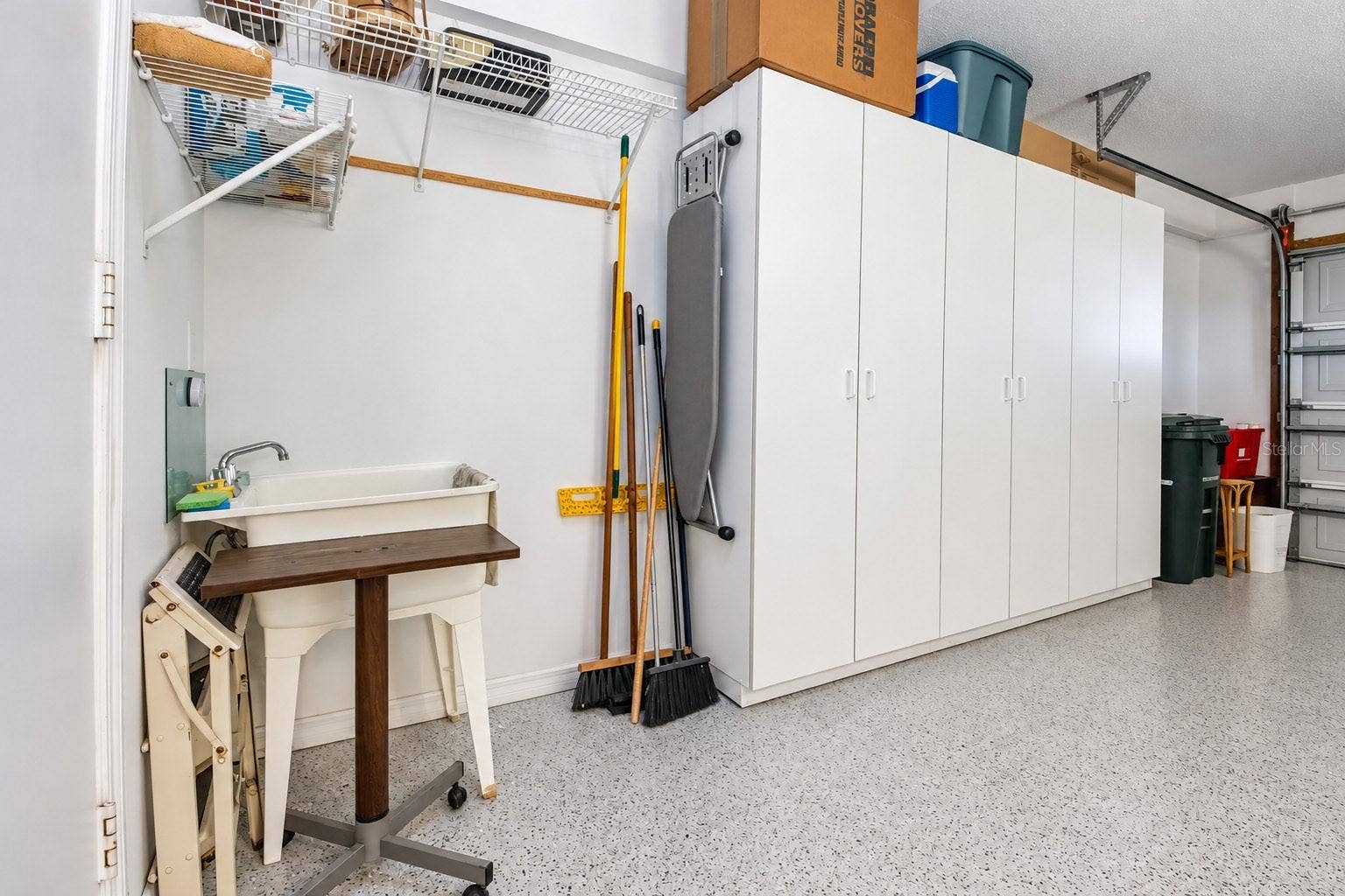 Two car garage, storage, laundry sink, finished floo