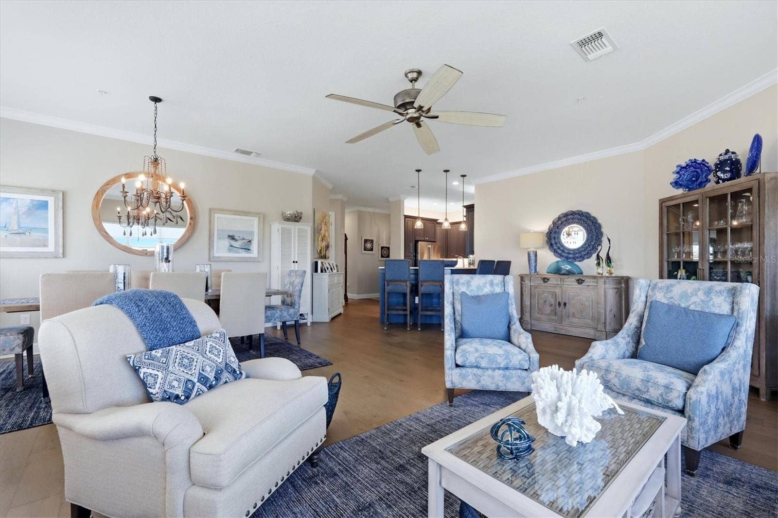7920 34TH AVENUE W, #303, Bradenton, FL 34209 Living room has gorgeous hardwood floors.