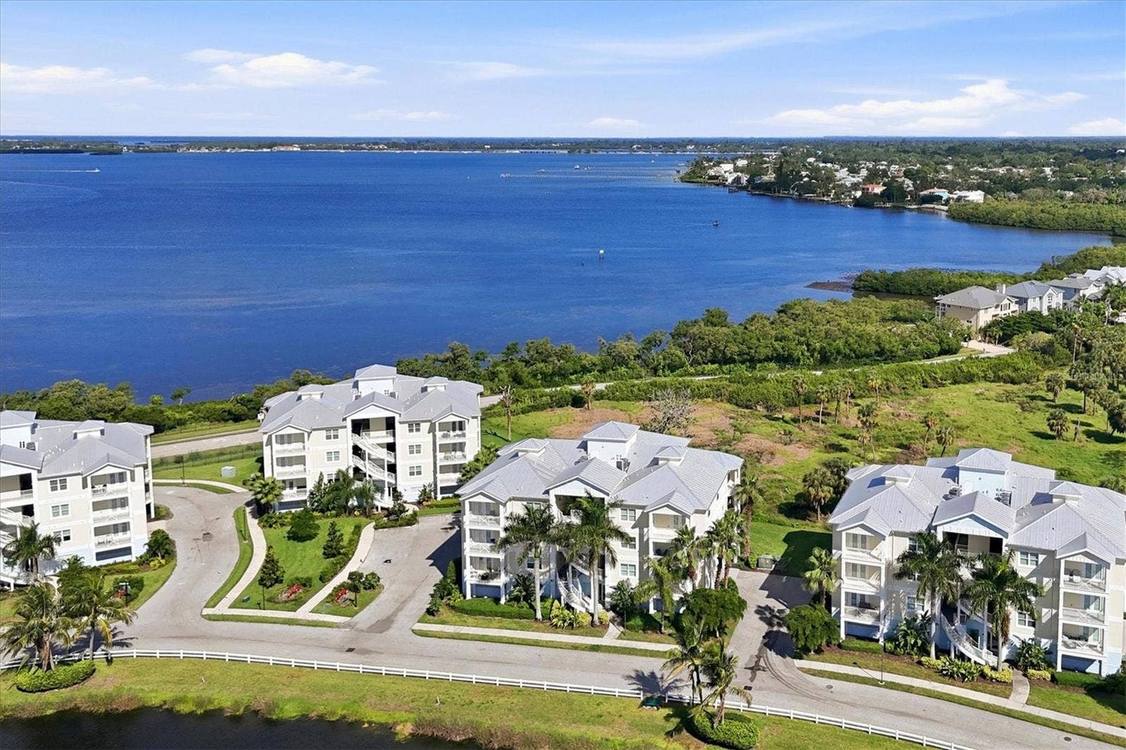 7920 34TH AVENUE W, #303, Bradenton, FL 34209 Aerial with Palma Sola Bay beyond.