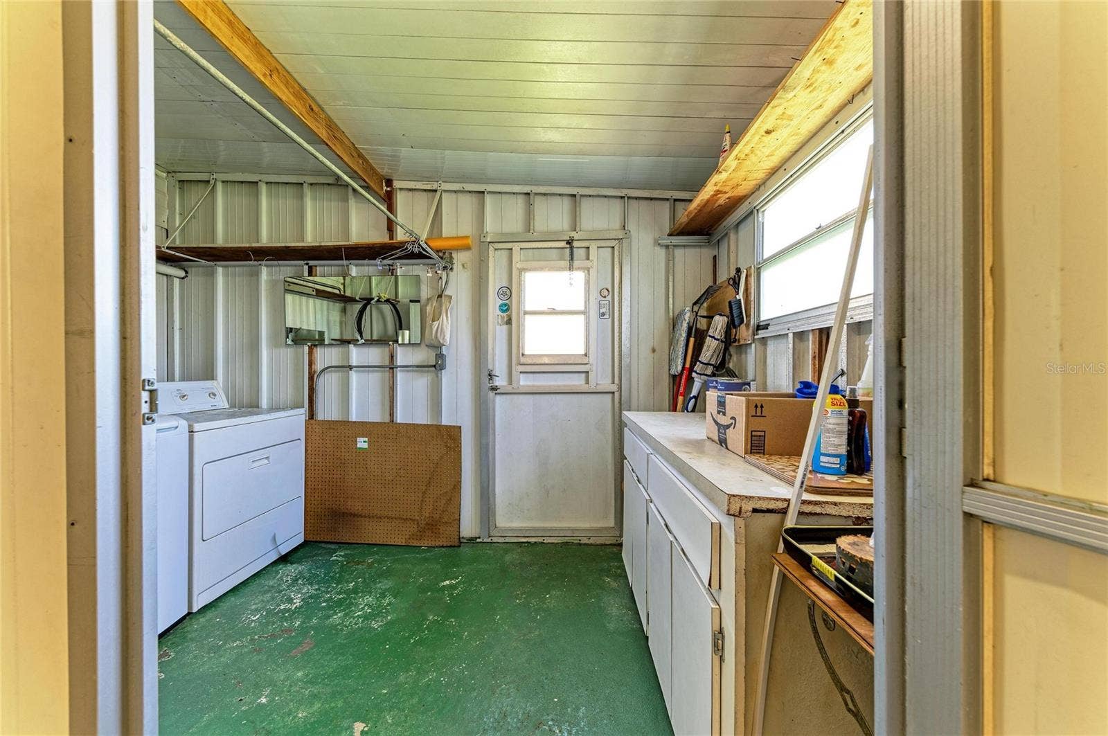4924 OAKLAND HILLS AVENUE, Sarasota, FL 34234 Laundry room and workshop