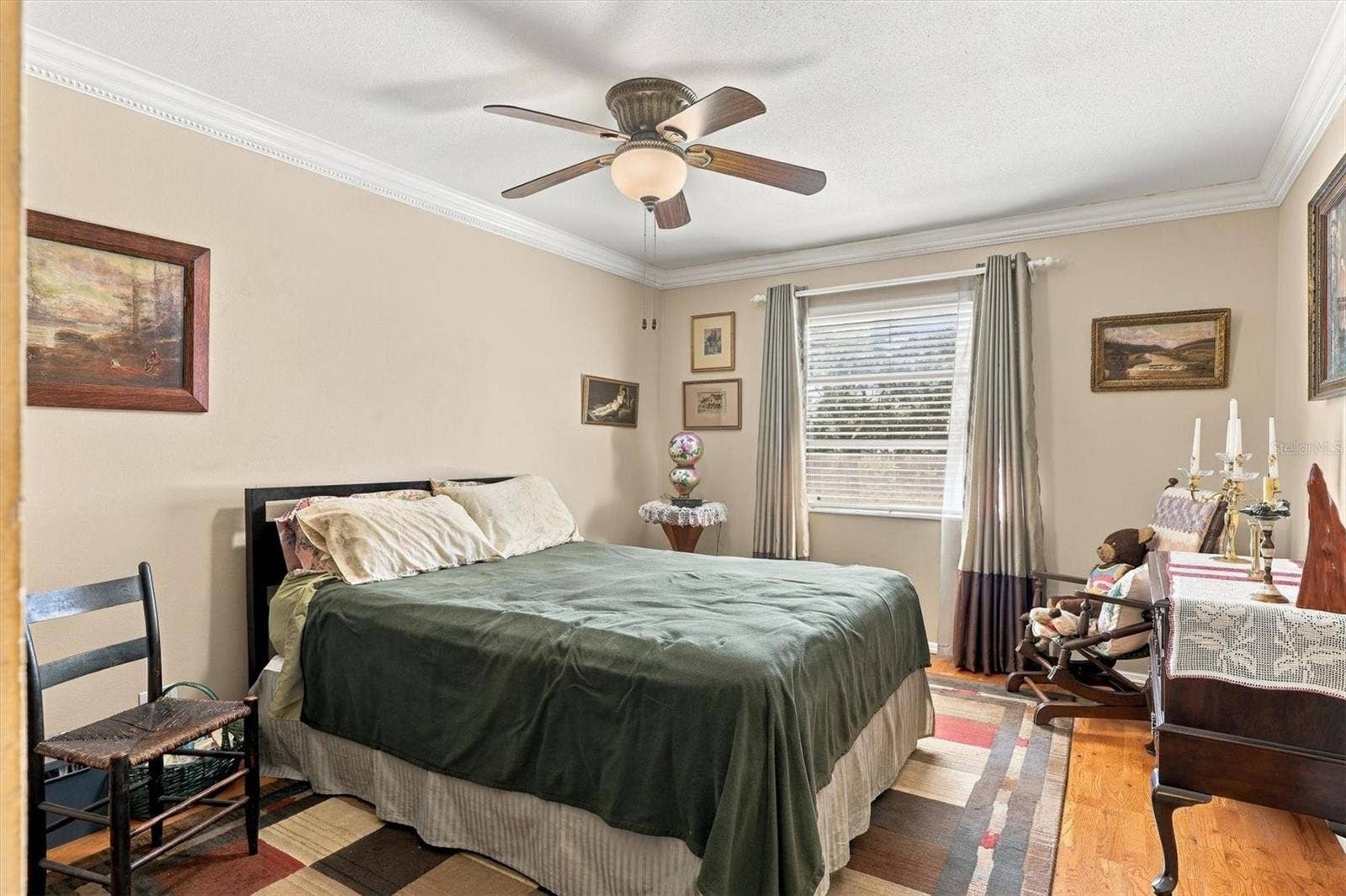 3950 ROXANE BOULEVARD, #3B, Sarasota, FL 34235 large bedroom with window and hard wood floors