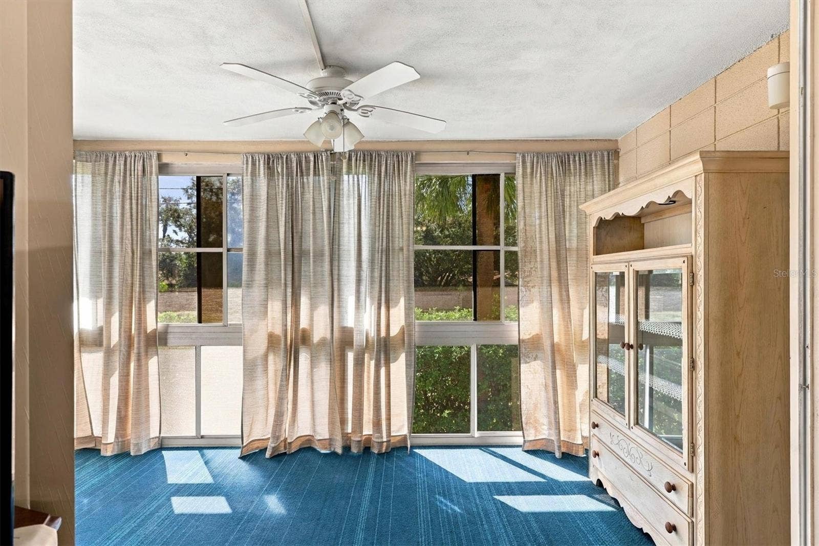 3950 ROXANE BOULEVARD, #3B, Sarasota, FL 34235 covered lanai with ceiling fan