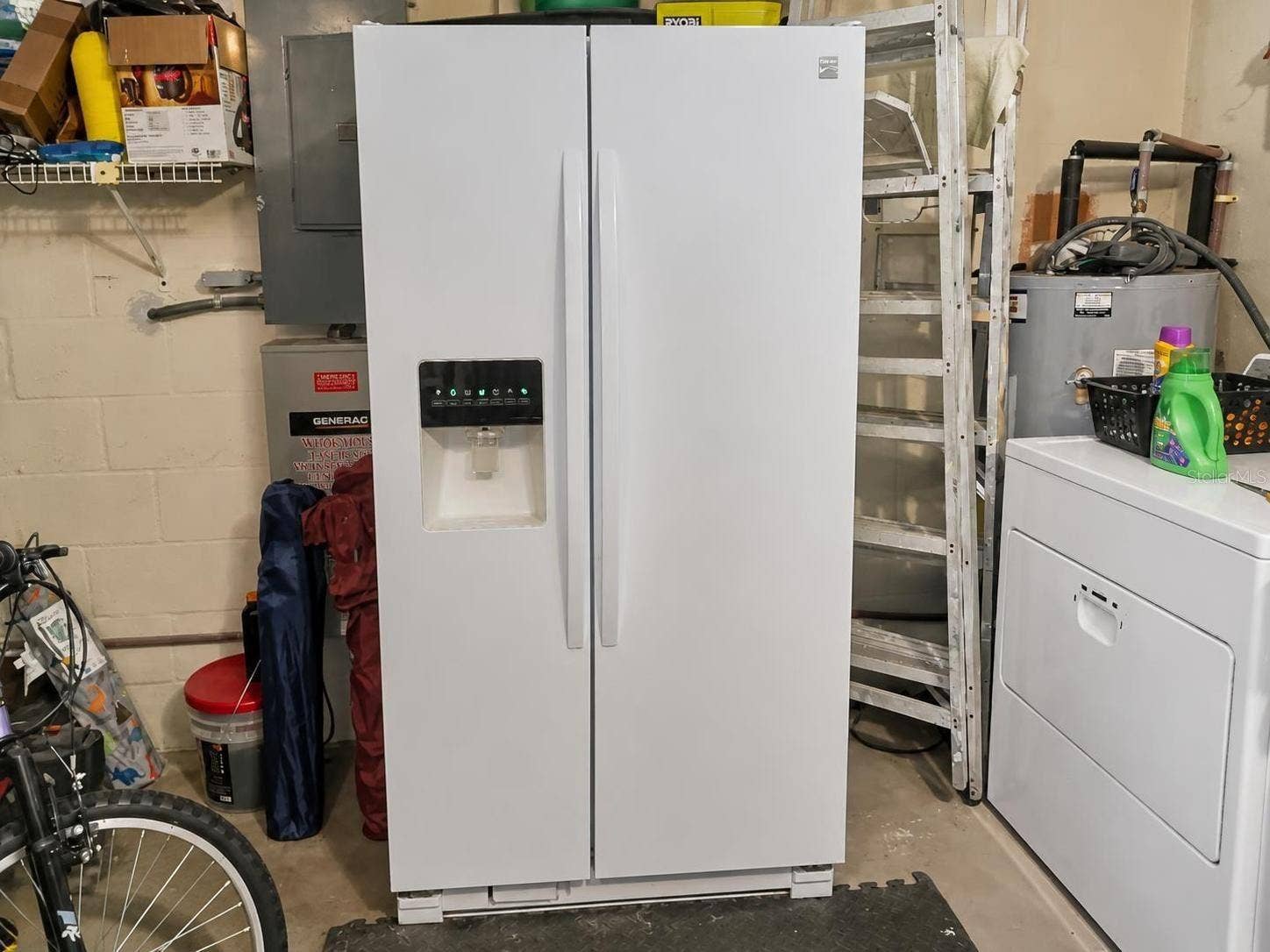 2074 W HIBISCUS ROAD, Avon Park, FL 33825 Fridge in the garage