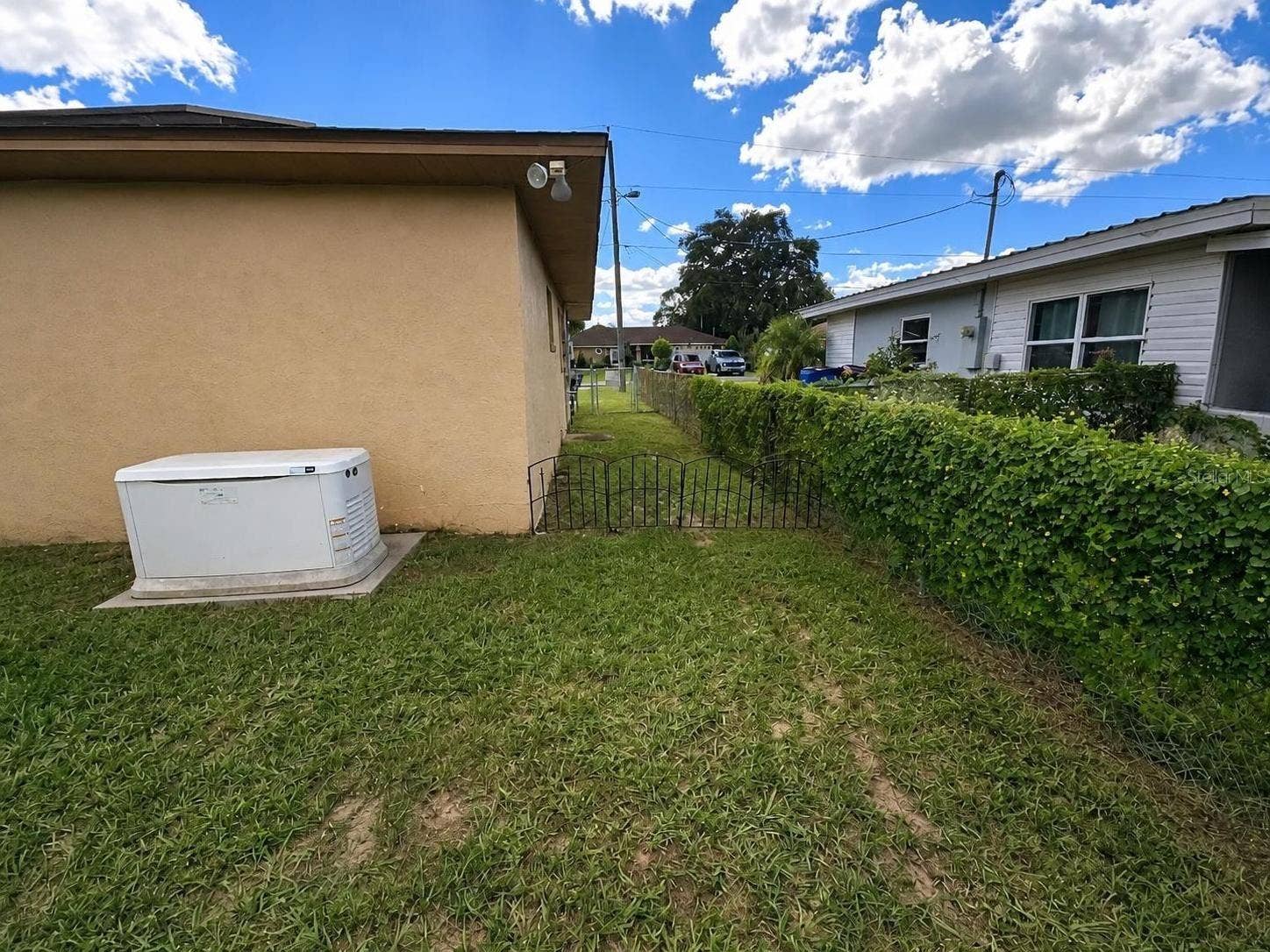 2074 W HIBISCUS ROAD, Avon Park, FL 33825 Side yard
