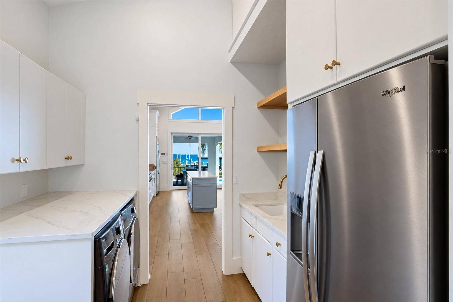 1519 RIVERVIEW LANE, Bradenton, FL 34209 Downstairs utility room and butlers pantry