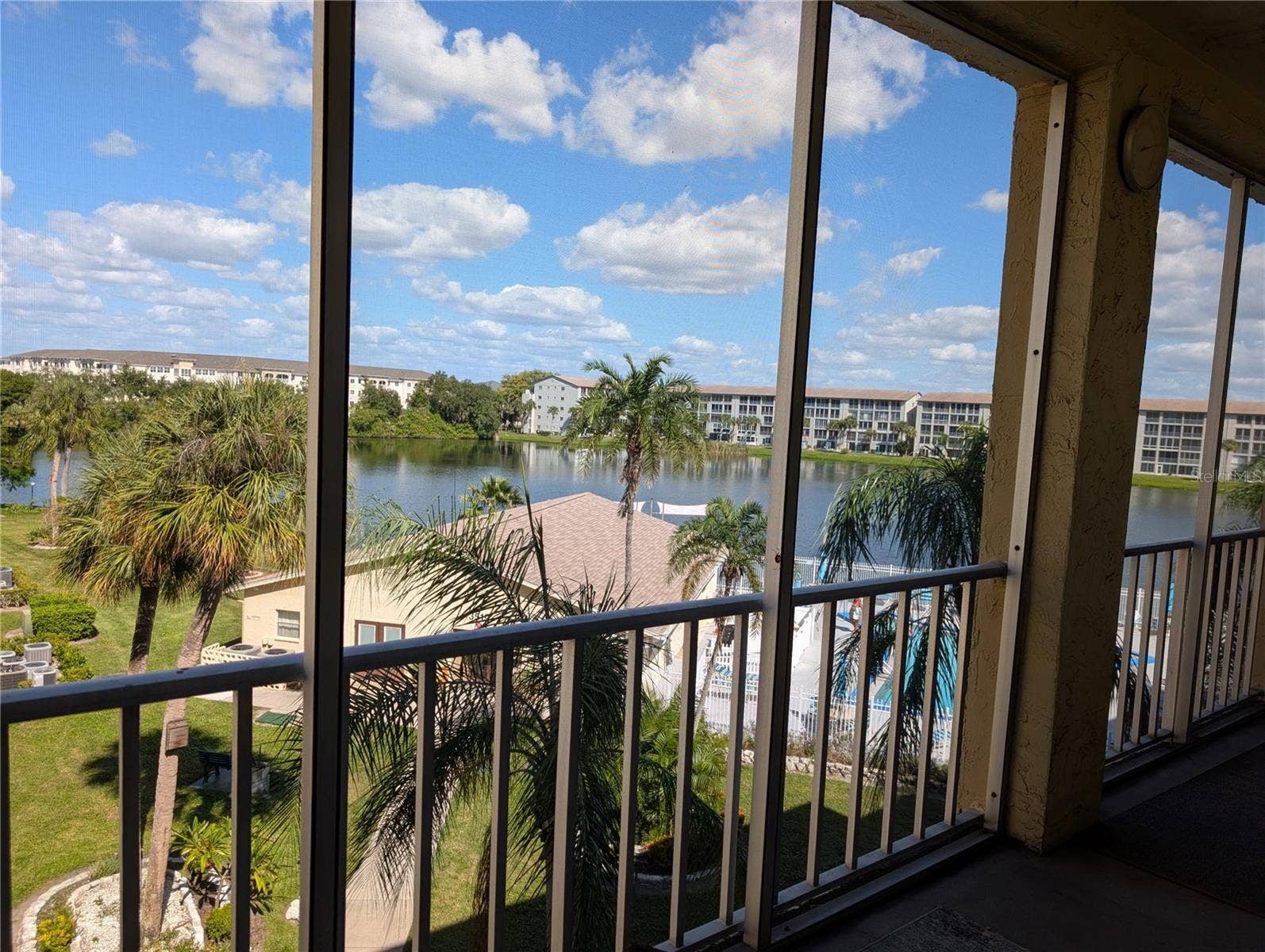 3779 LAKE BAYSHORE DRIVE, #H-402, Bradenton, FL 34205 Lake, pool, clubhouse views...