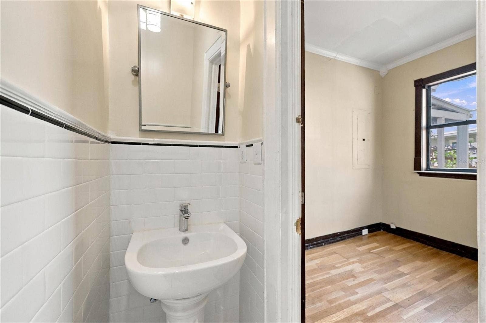 5208 HARBOR ROAD, Bradenton, FL 34209 Half bath in office- den