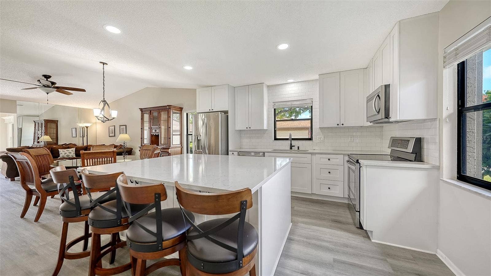 Updated kitchen with stainless steel appliances.