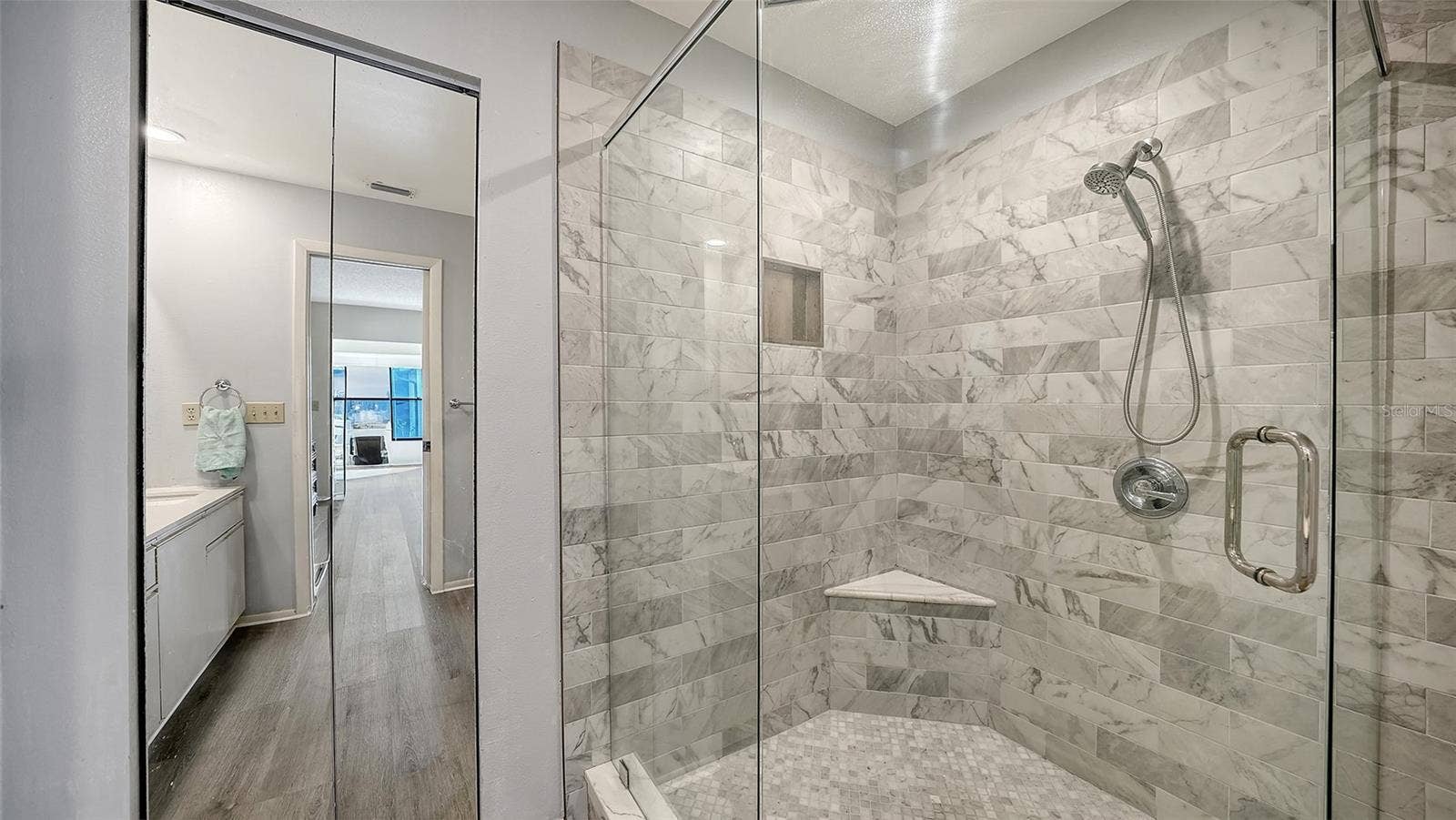 Primary bath updated walk-in shower.