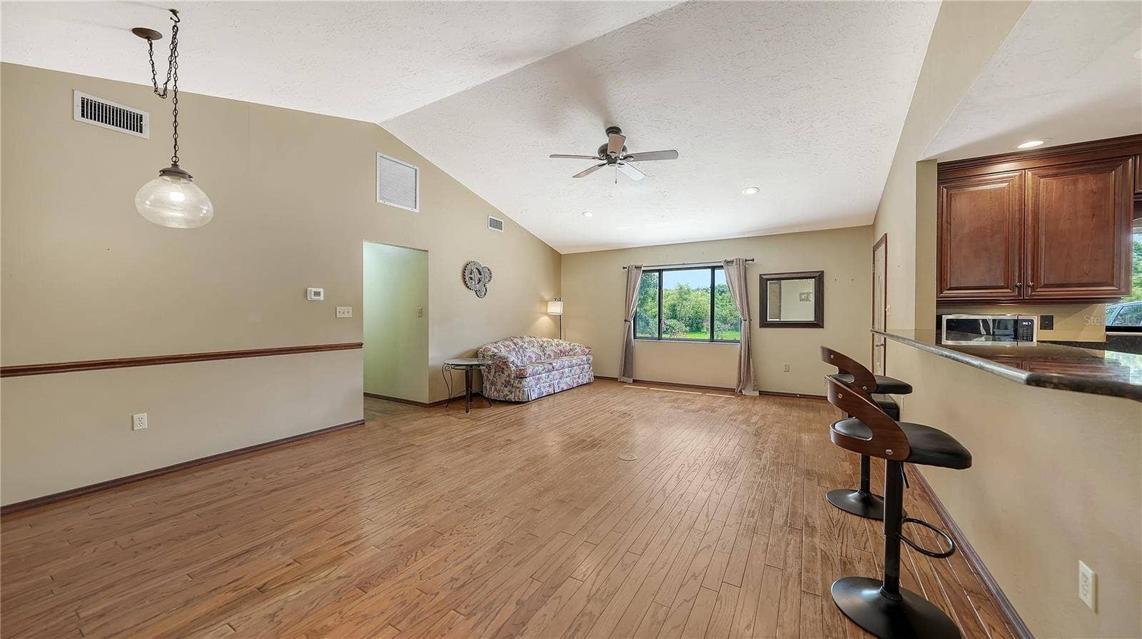 4842 + LOT 8 & 9 NUTMEG AVENUE, Sarasota, FL 34231 Living Room / Dining Room