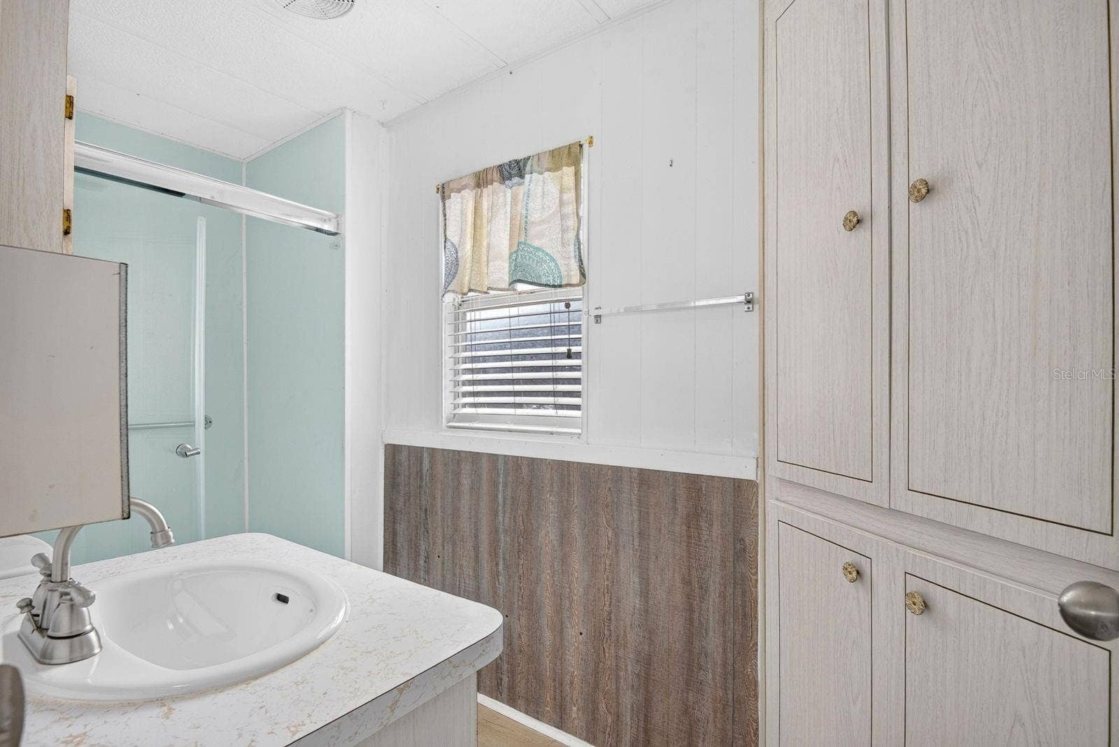 60 4TH STREET, Bradenton, FL 34210 Bathroom and linen closet