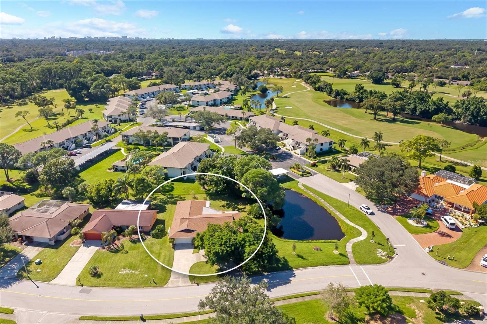 Single-story home on a quarter-acre homesite with a 2 car garage and circular driveway.