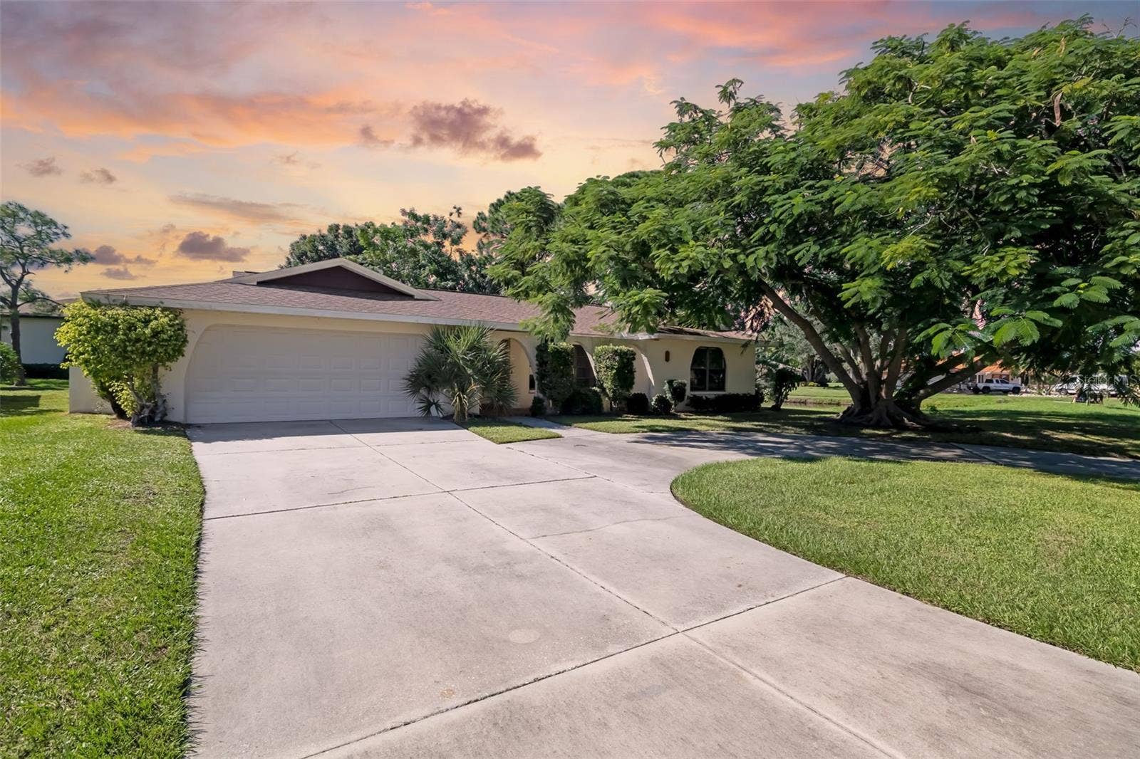 Mature shade trees and a new roof (2023) welcome you home.