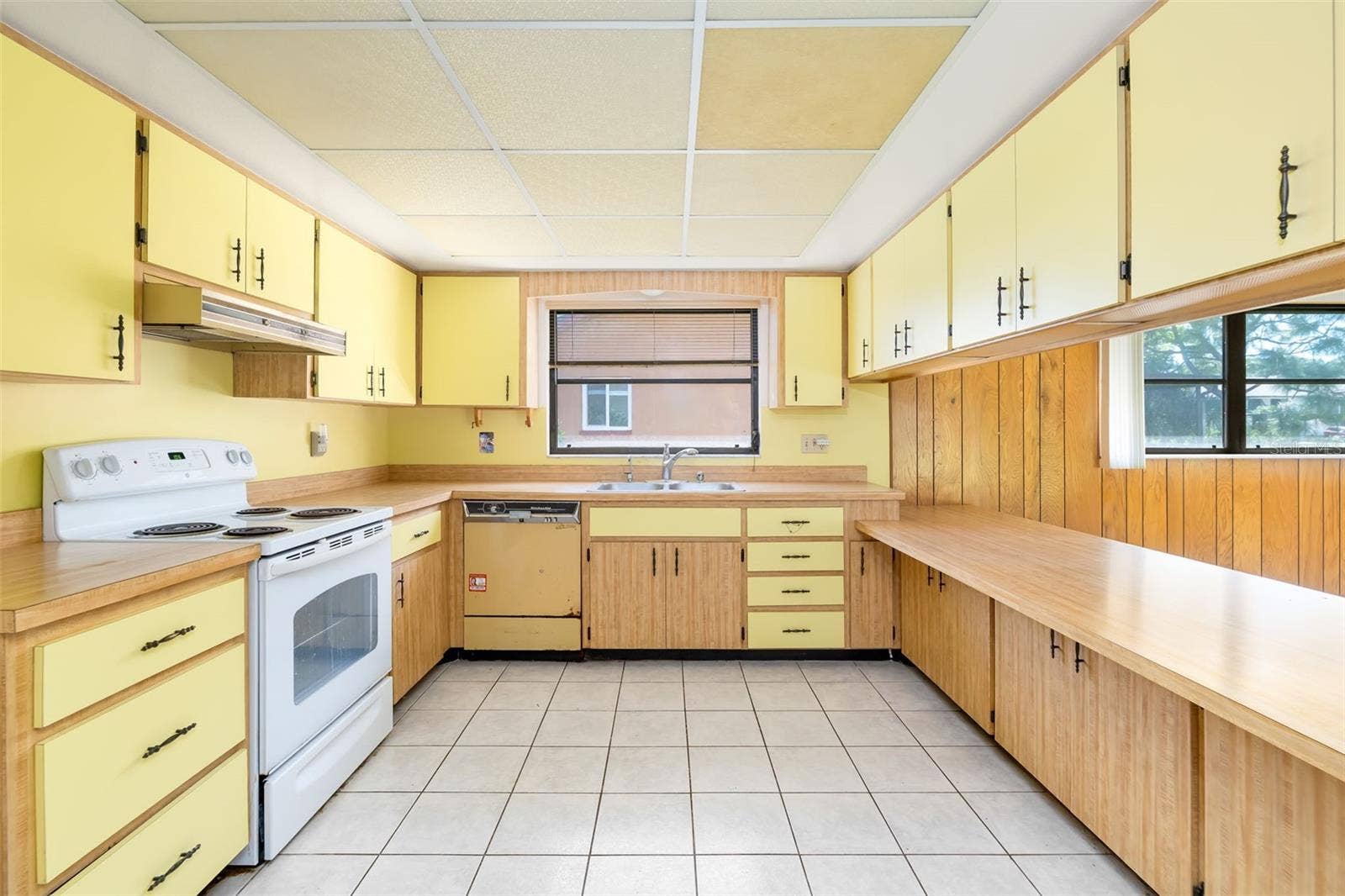 Generous cabinetry and counter space, ready for your vision.
