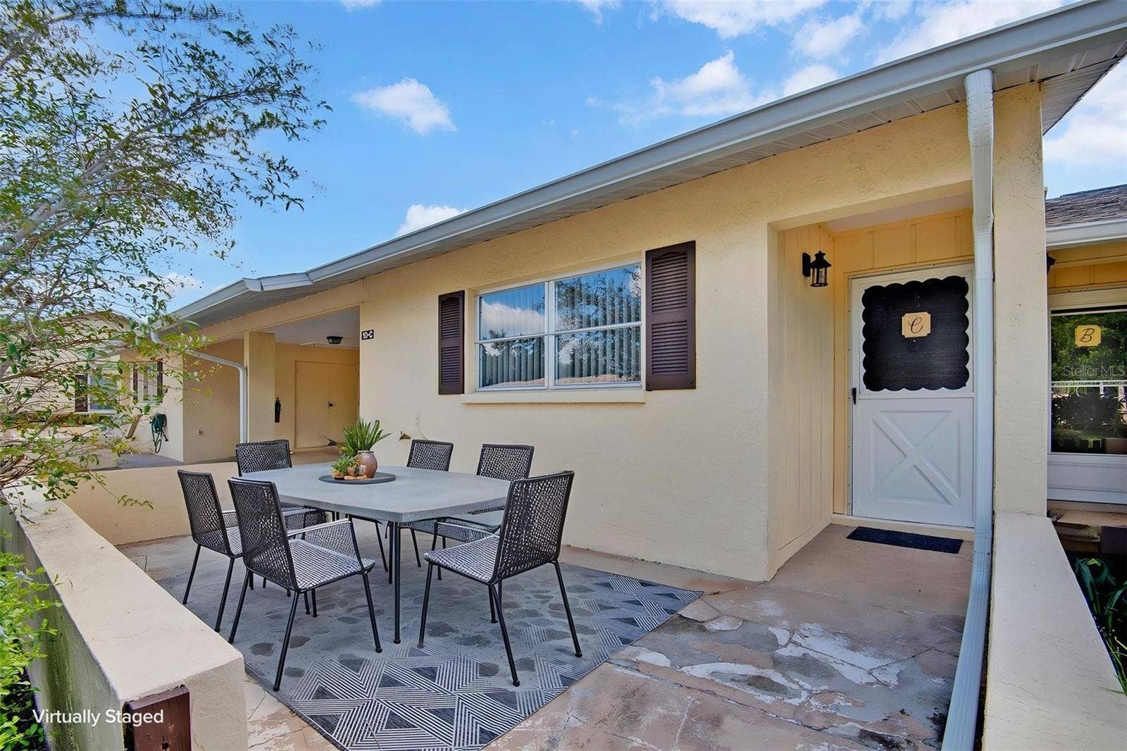 390 301 BOULEVARD W, #10C, Bradenton, FL 34205 Cozy Front Patio-virtually staged
