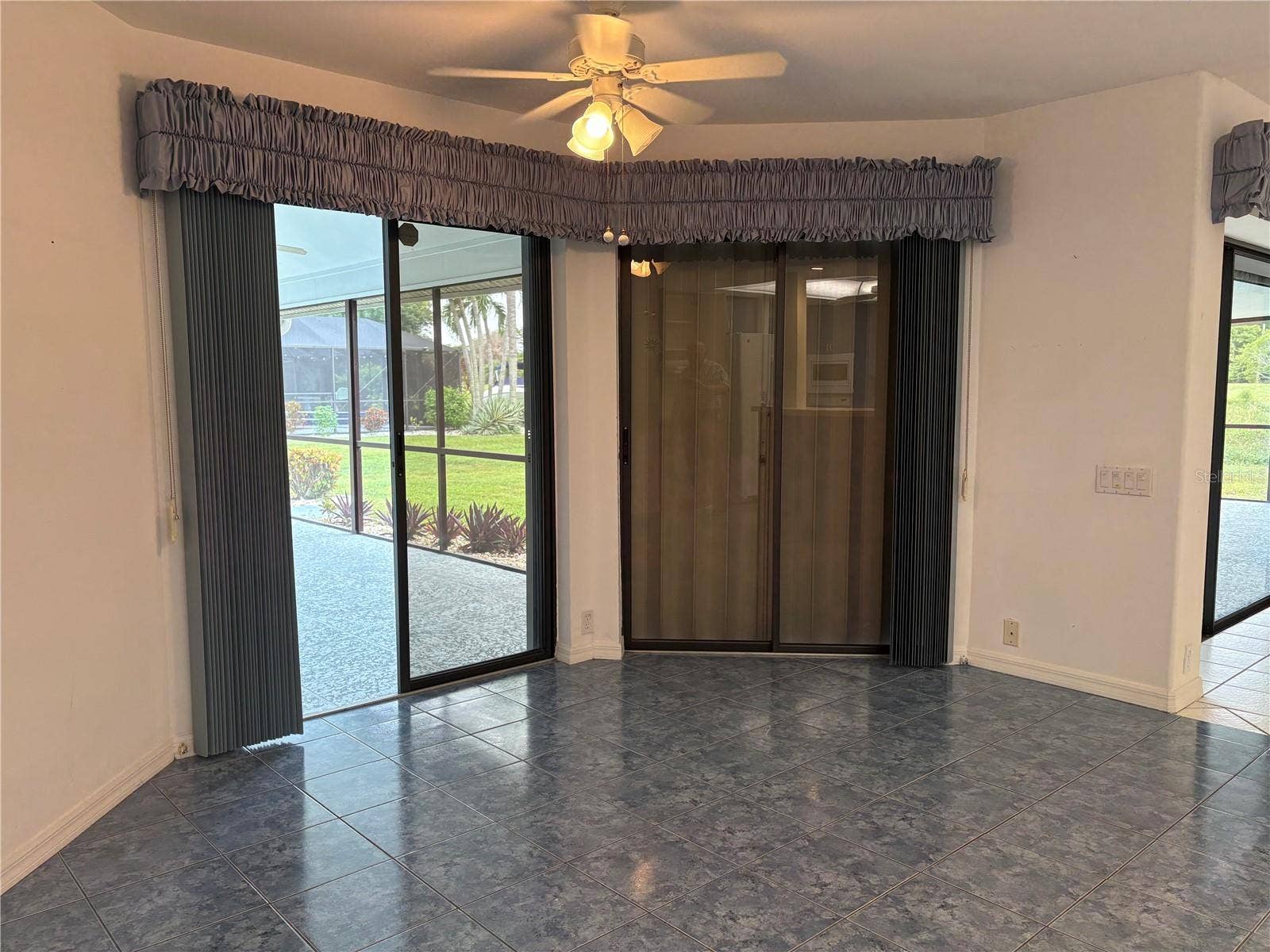 4328 COUNTRY CLUB BOULEVARD, Cape Coral, FL 33904 Family room towards Kitchen
