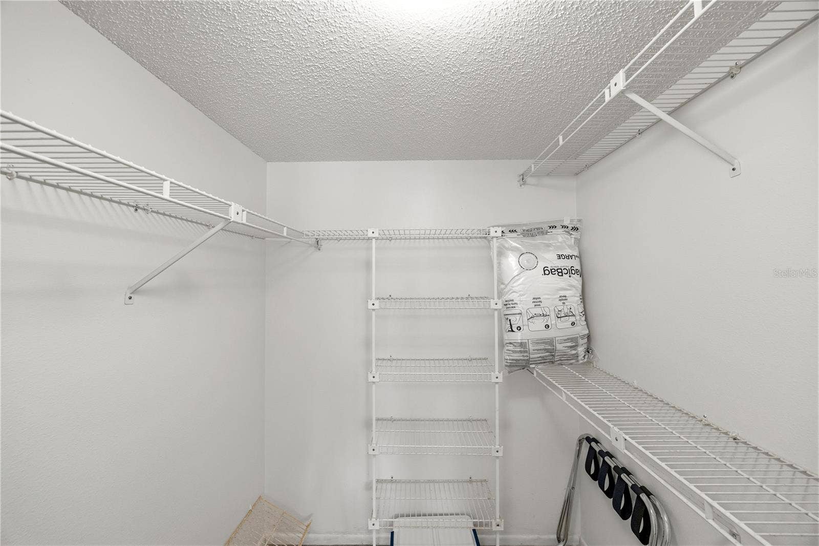 Primary Bedroom Walk-in Closet