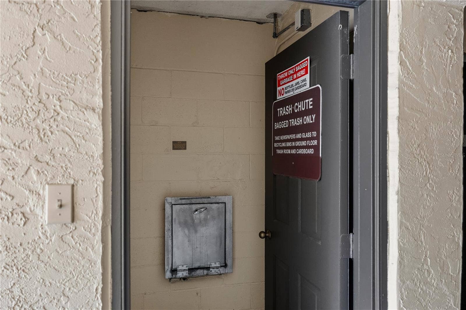 Convenient Trash Shoot, Just Outside Storage Unit