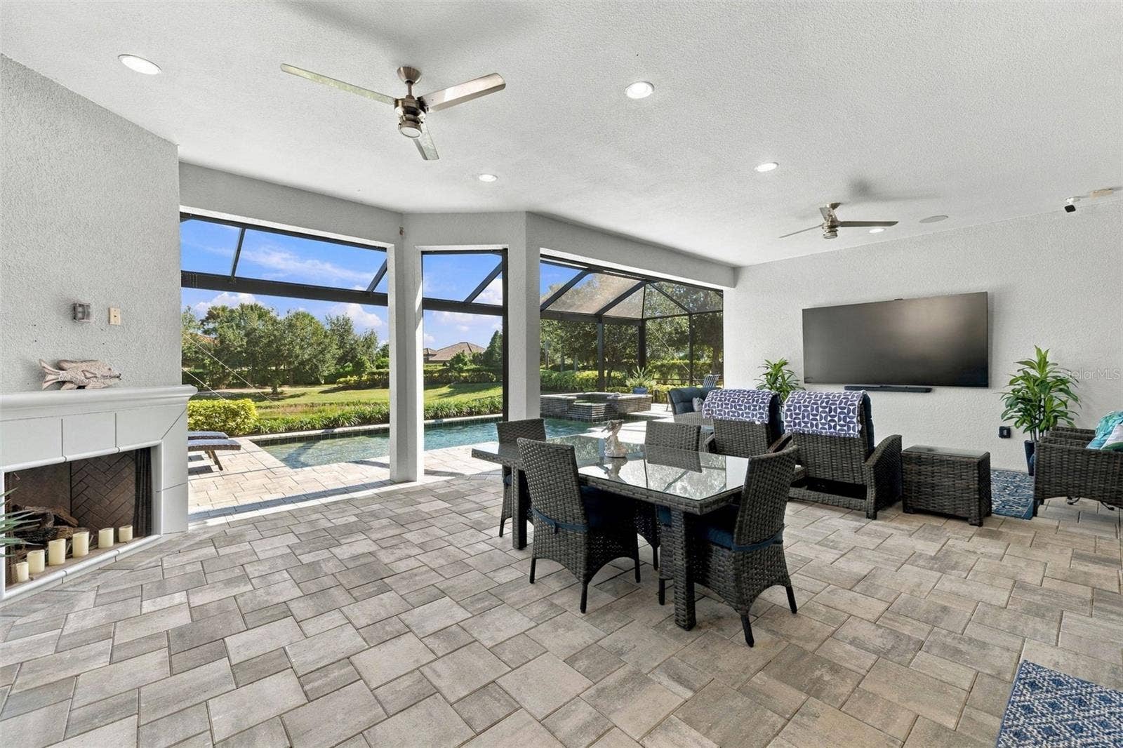 4723 BENITO COURT, Bradenton, FL 34211 Outdoor Dining and Living Room with ample under ceiling space