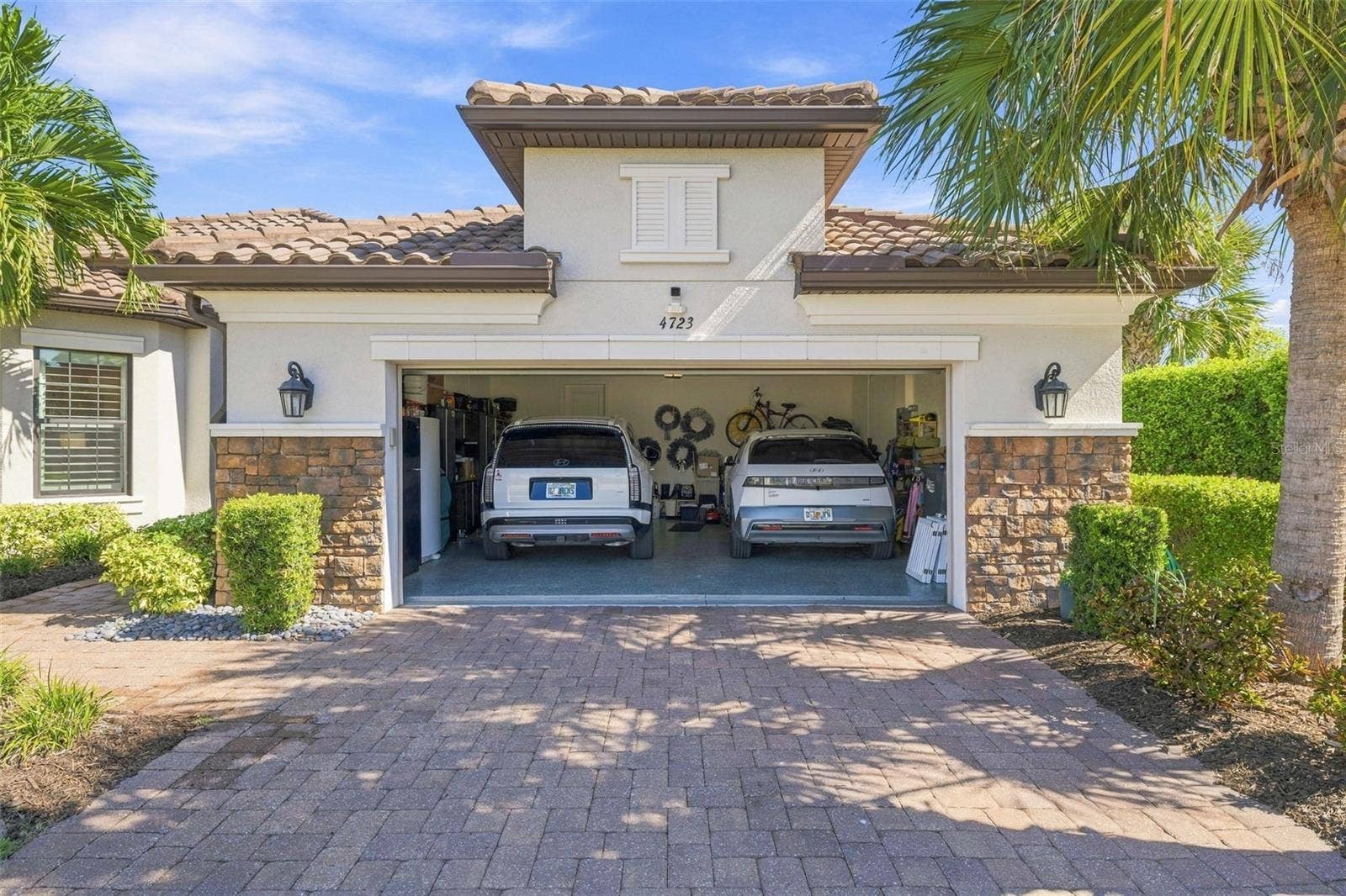 4723 BENITO COURT, Bradenton, FL 34211 Extended garage easily hold 2 vehicles