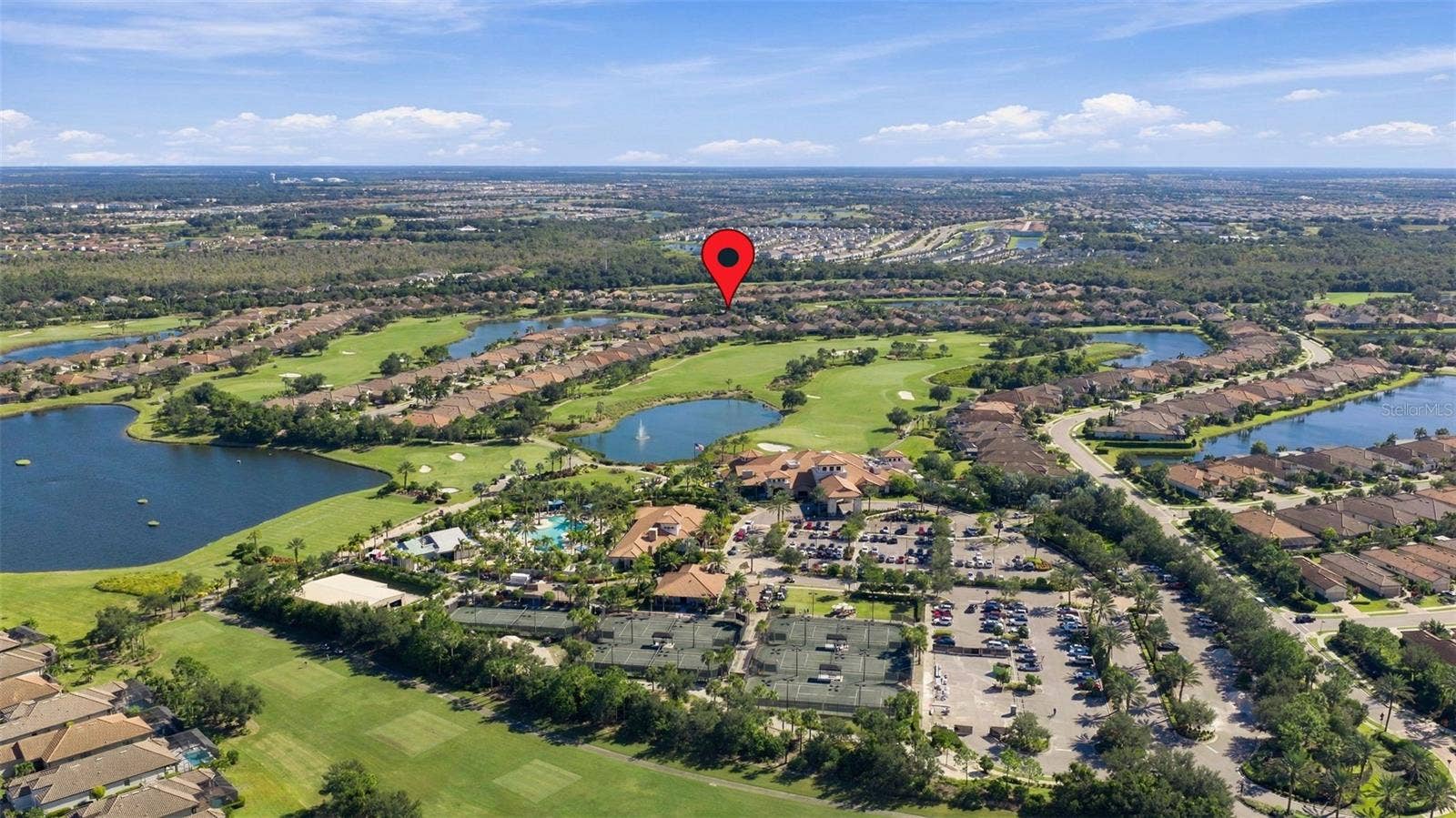 4723 BENITO COURT, Bradenton, FL 34211 Culinary Center, Wellness Center, Tennis Courts and Resort Pool with tiki in foreground
