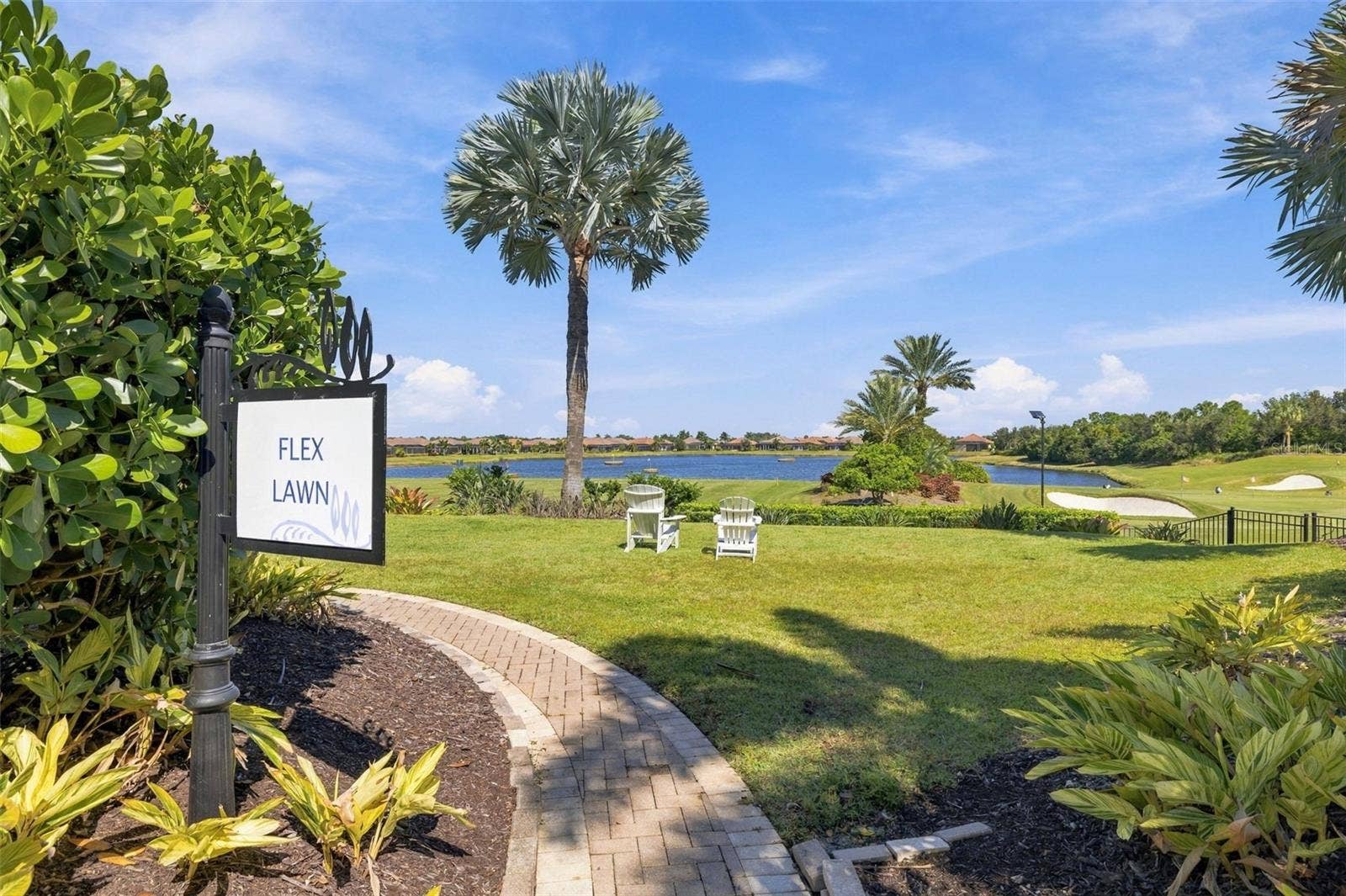 4723 BENITO COURT, Bradenton, FL 34211 Lawn overlooking the Driving Range, Chipping area and Putting Green