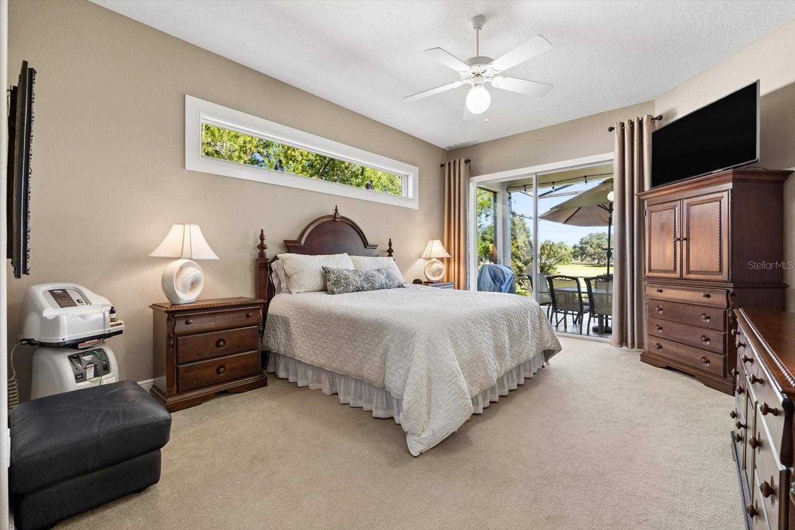 9921 LAUREL VALLEY AVENUE CIRCLE, Bradenton, FL 34202 Primary Owners Suite with sliders out to patio