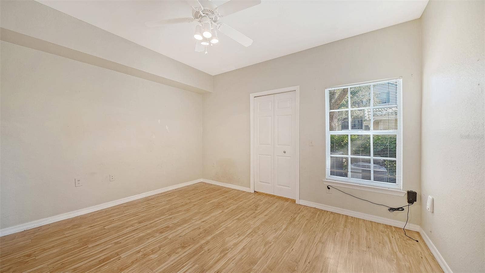 5168 NORTHRIDGE ROAD, #103, Sarasota, FL 34238 GUEST BEDROOM WITH WALK IN CLOSET
