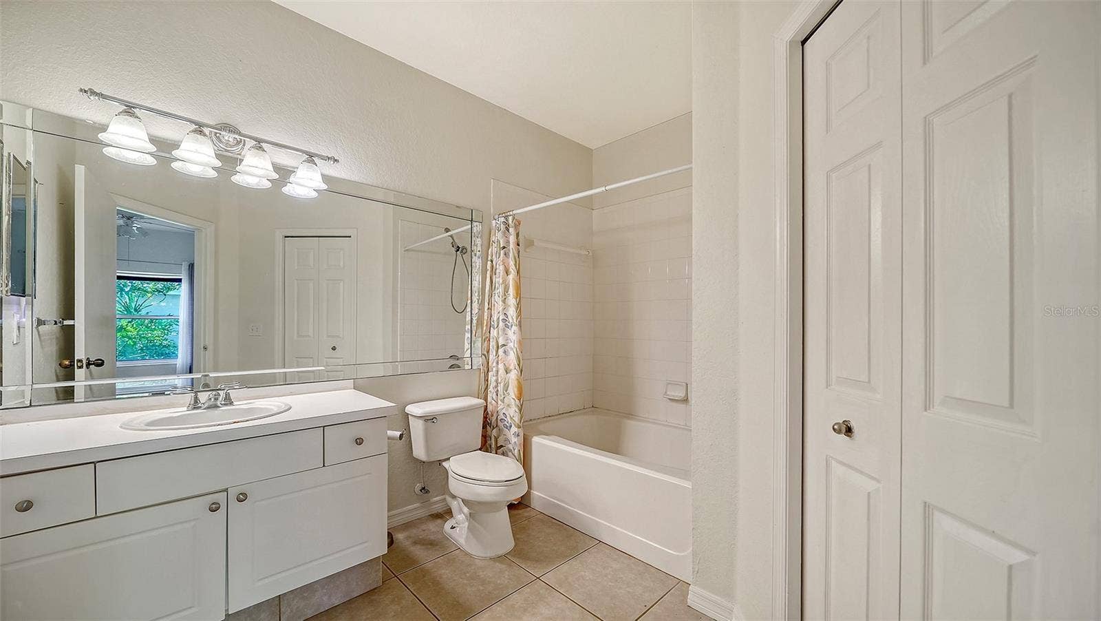 5168 NORTHRIDGE ROAD, #103, Sarasota, FL 34238 MASTER BATHROOM WITH LINEN CLOSET