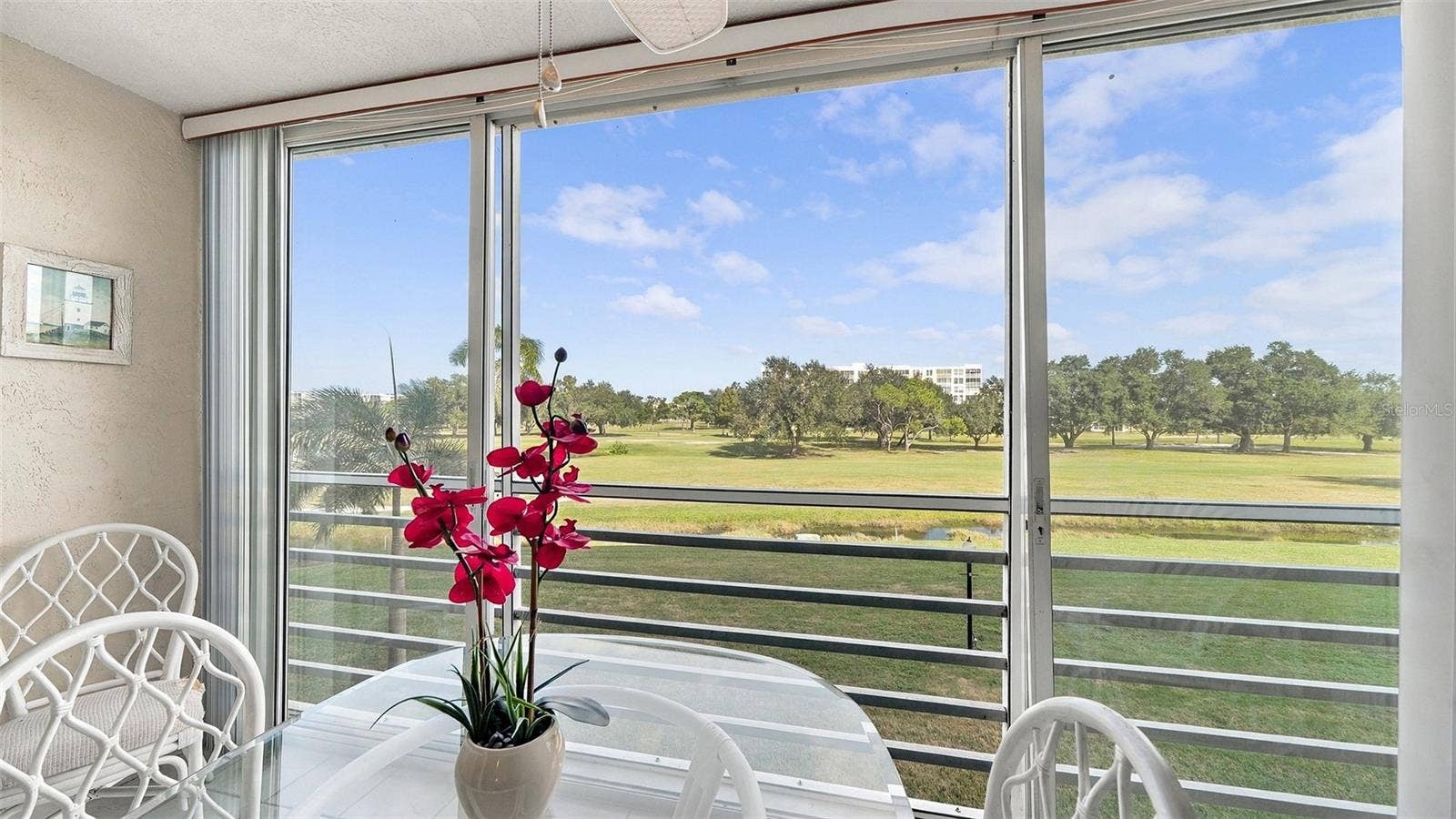 4550 PINEBROOK CIRCLE, #203, Bradenton, FL 34209 Lanai with golf course views