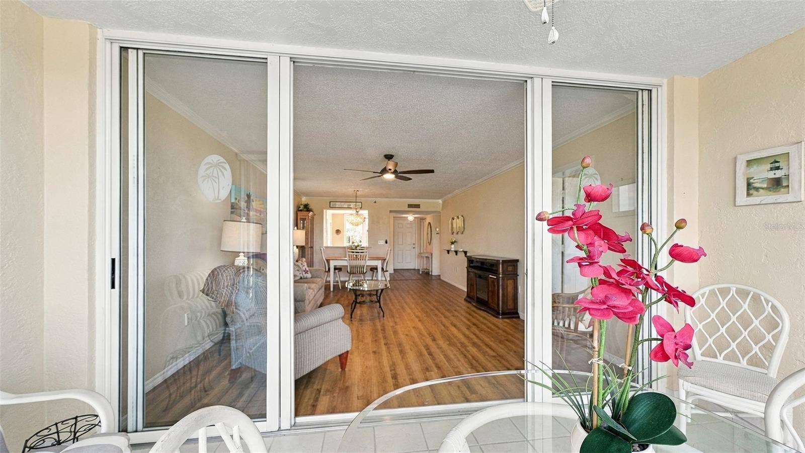 4550 PINEBROOK CIRCLE, #203, Bradenton, FL 34209 Living Room view from Lanai