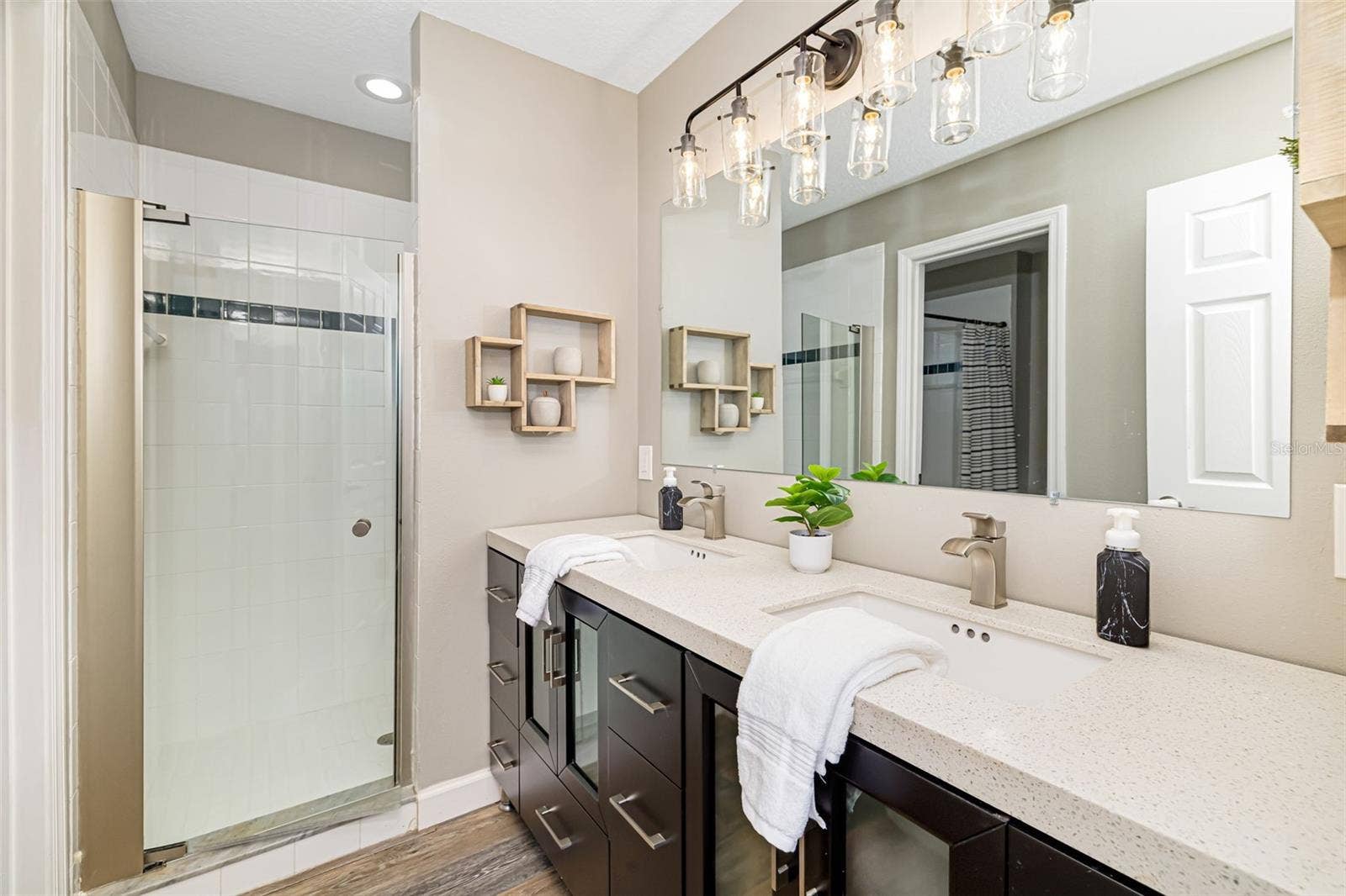 124 41ST CIRCLE E, Bradenton, FL 34208 Bathroom 3 - Upstairs with Dual Vanity, Separate Walk-In Shower with adjoining room with Toilet and Tub/Shower combination