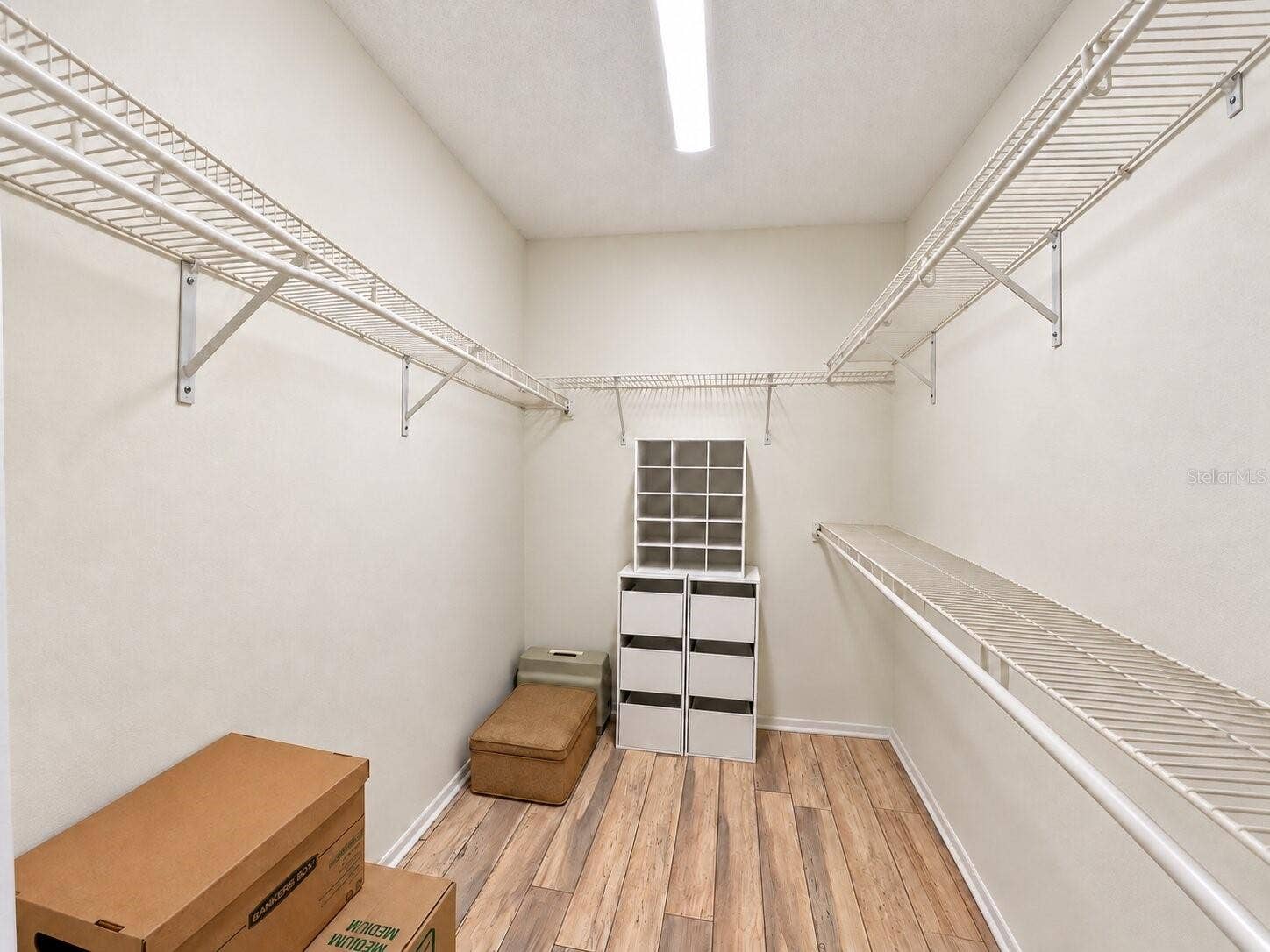 Spacious primary walk-in closet