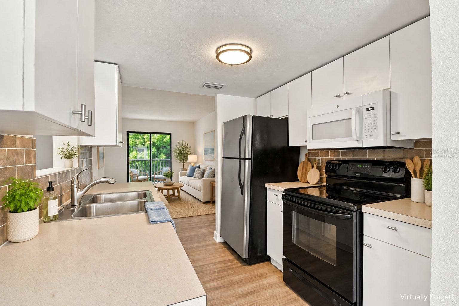 5310 26TH STREET W, #1506, Bradenton, FL 34207 Virtually staged kitchen