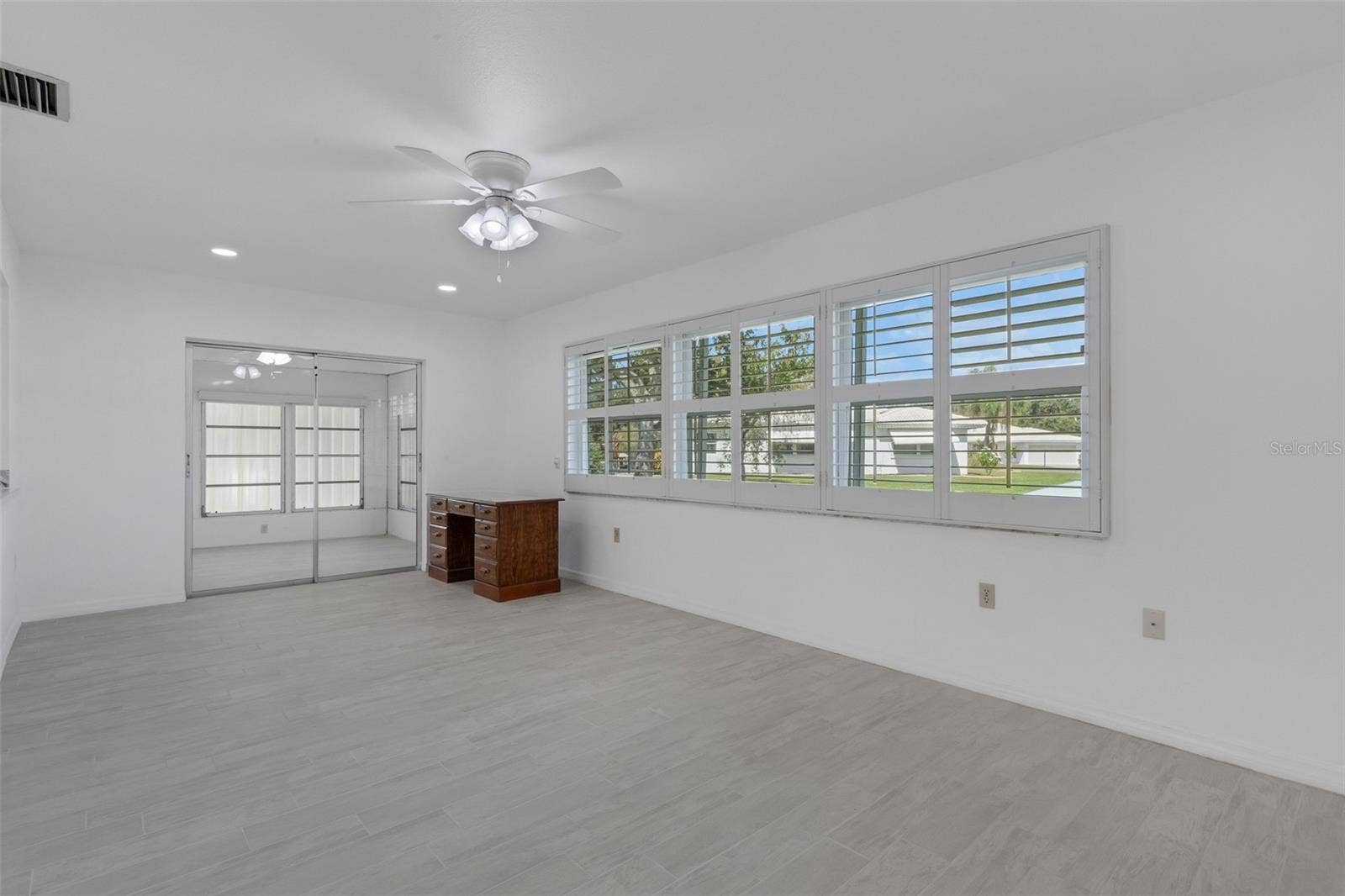 1311 BOTTLEBRUSH DRIVE, Bradenton, FL 34208 Family Room - Desk is removed.