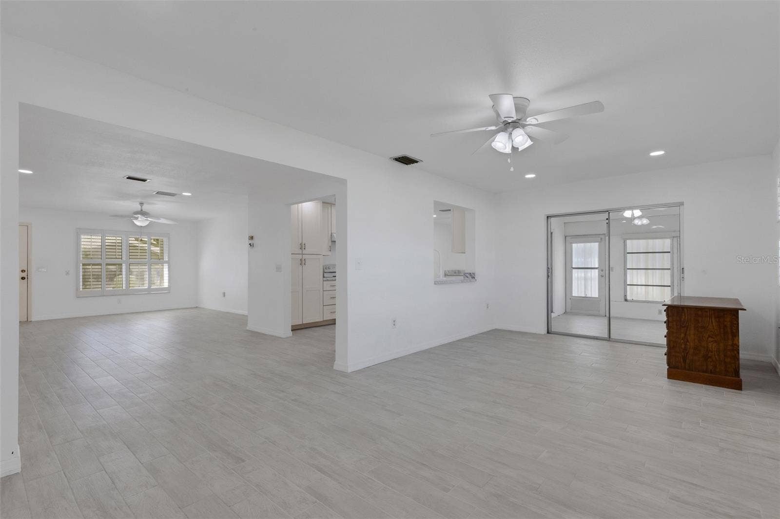 1311 BOTTLEBRUSH DRIVE, Bradenton, FL 34208 Dining / Family Rooms - Desk is removed.