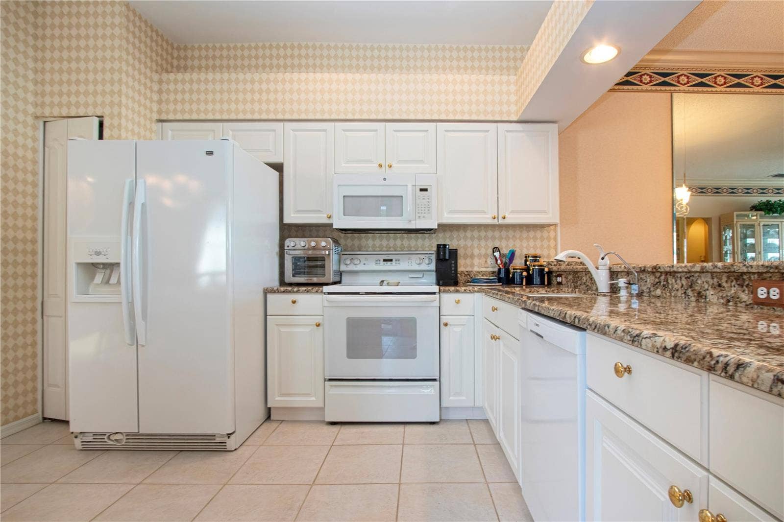 4937 CHASE OAKS DRIVE, Sarasota, FL 34241 Pass through counter to living room