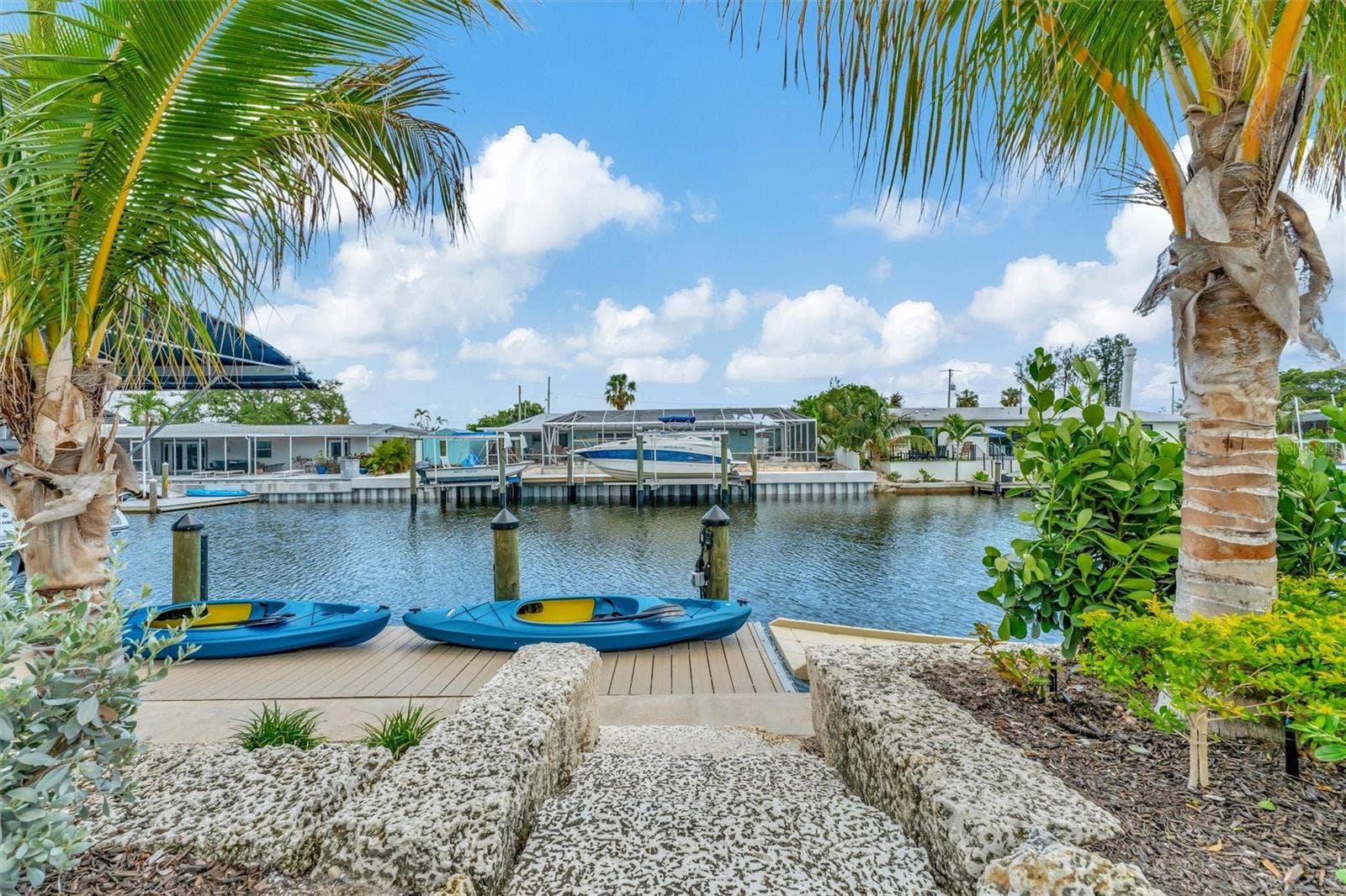 10115 KINGFISHER ROAD E, Bradenton, FL 34209 Underwater and above-water dock lighting enhances the waterfront ambiance.