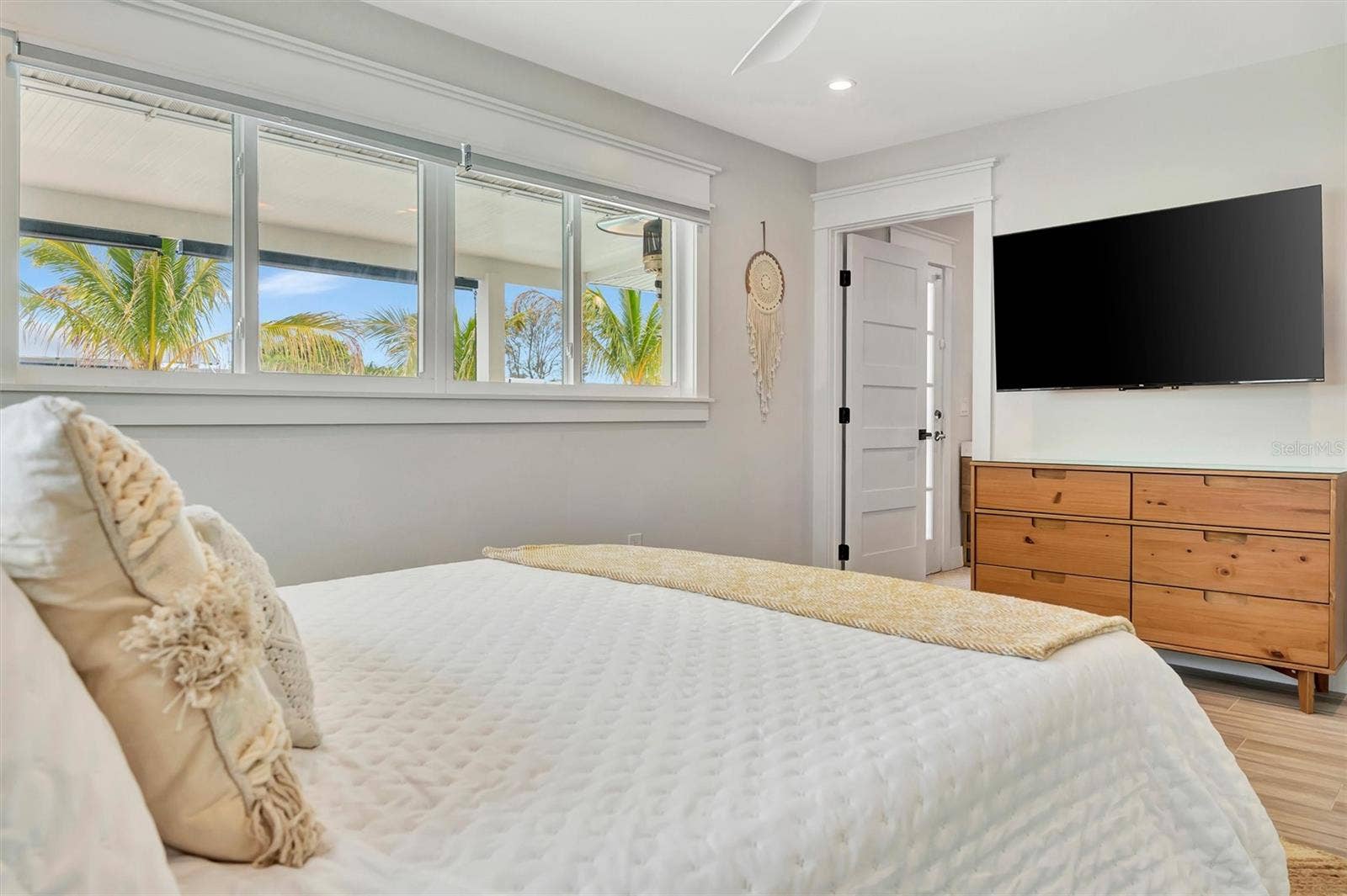10115 KINGFISHER ROAD E, Bradenton, FL 34209 Bedroom #2 with Ensuite (Ensuite has direct access to the lanai and heated saltwater pool)