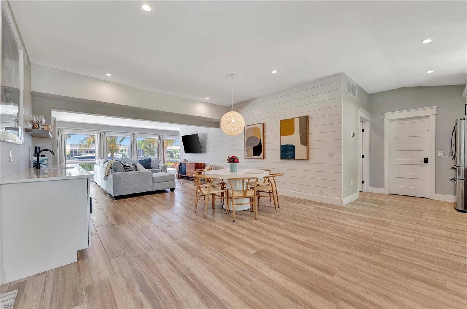 10115 KINGFISHER ROAD E, Bradenton, FL 34209 Updated mid-century home with 3 bedrooms, 3 bathrooms, and inviting indoor-outdoor living.