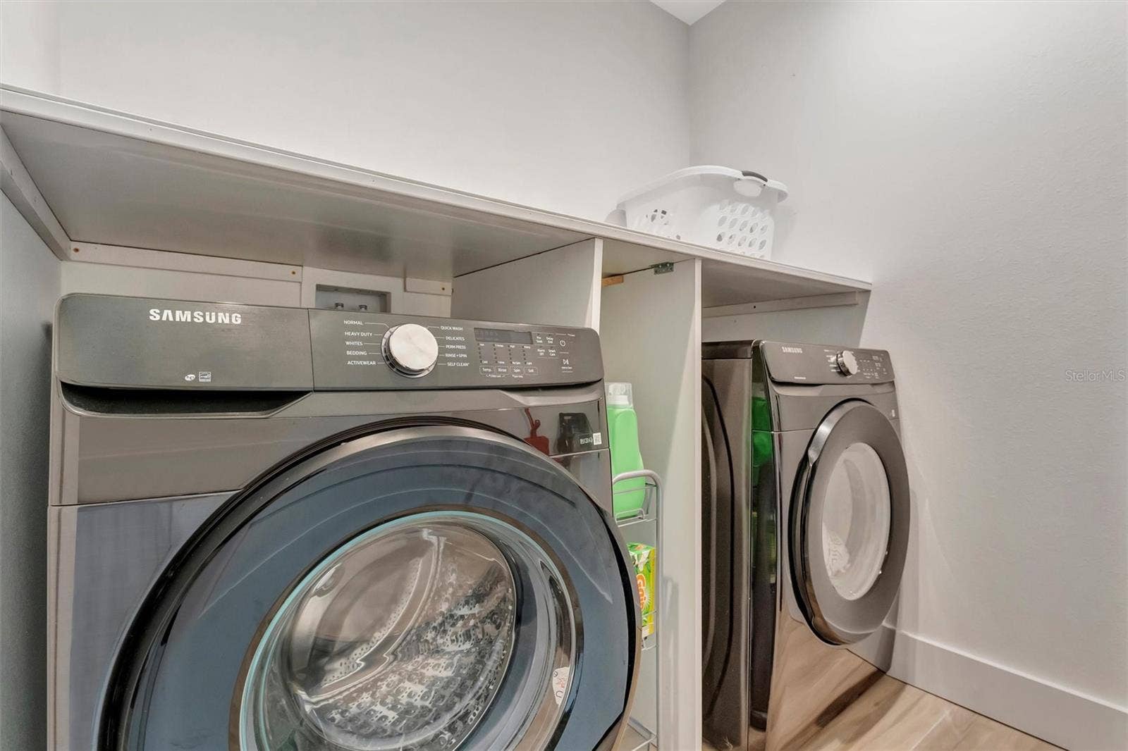 10115 KINGFISHER ROAD E, Bradenton, FL 34209 Indoor laundry with extra storage, two-car garage with epoxy floors, and low-maintenance irrigated yard.