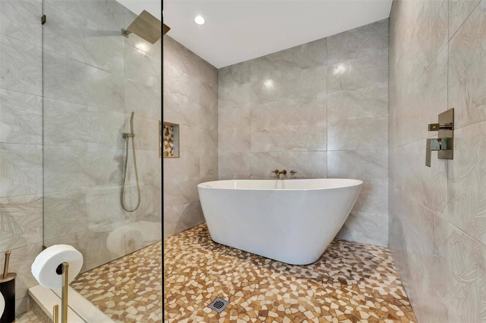 10115 KINGFISHER ROAD E, Bradenton, FL 34209 Updated bathroom with freestanding tub and separate shower.