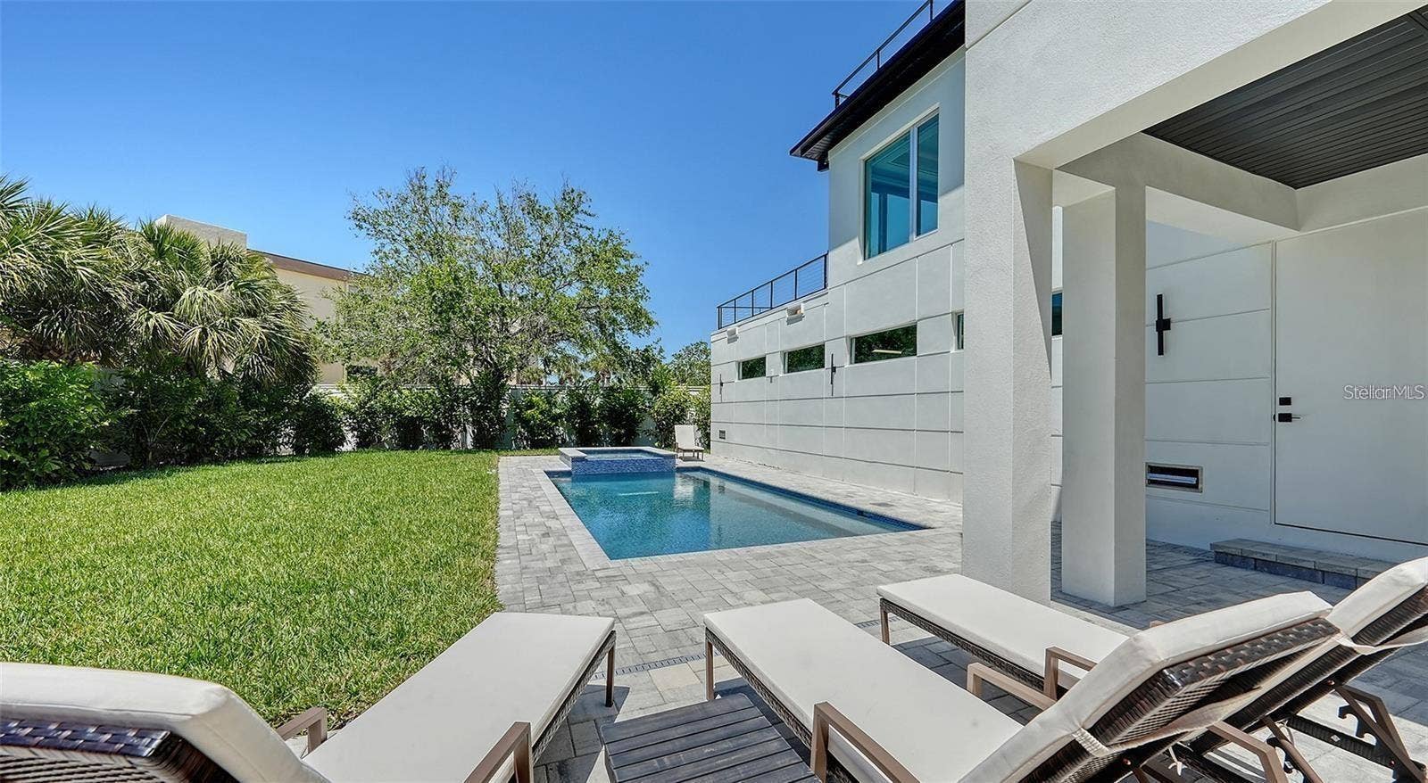 8800 MIDNIGHT PASS ROAD, Sarasota, FL 34242 Heated saltwater pool and hot tub spa