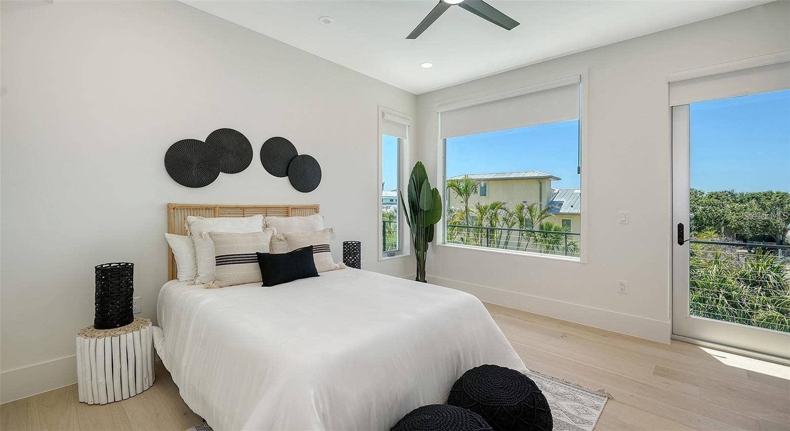 8800 MIDNIGHT PASS ROAD, Sarasota, FL 34242 Guest bedroom with access to balcony