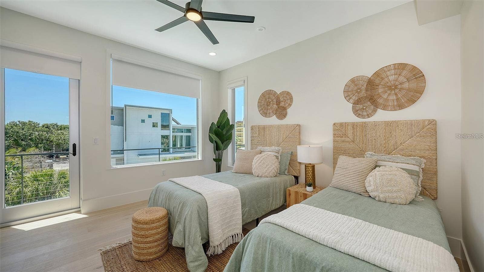 8800 MIDNIGHT PASS ROAD, Sarasota, FL 34242 Guest bedroom with access to balcony