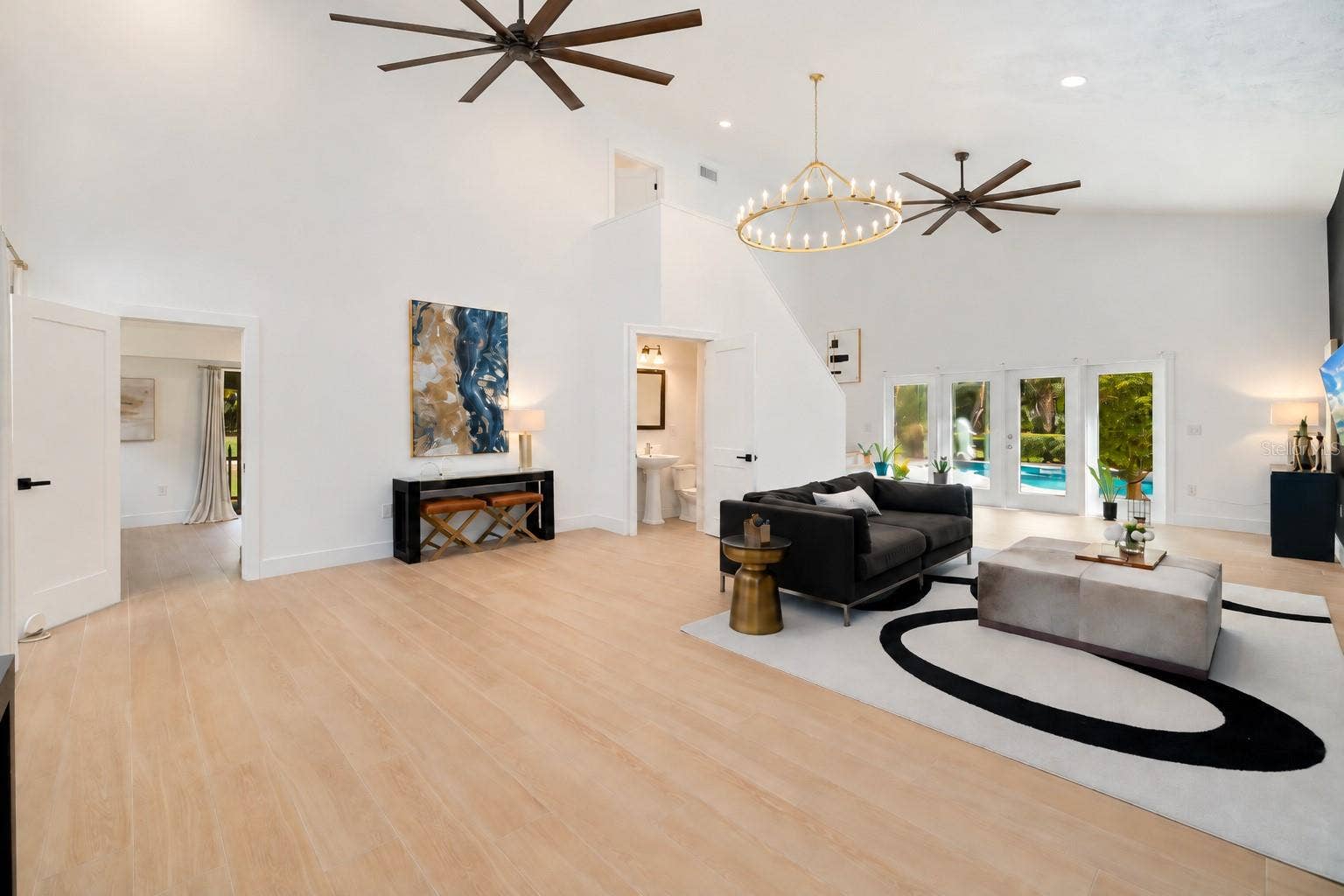 403 LONGBOW TRAIL, Osprey, FL 34229 virtually renovated half-bath (Guest Bath) with Bigger Fans in Ceiling Image