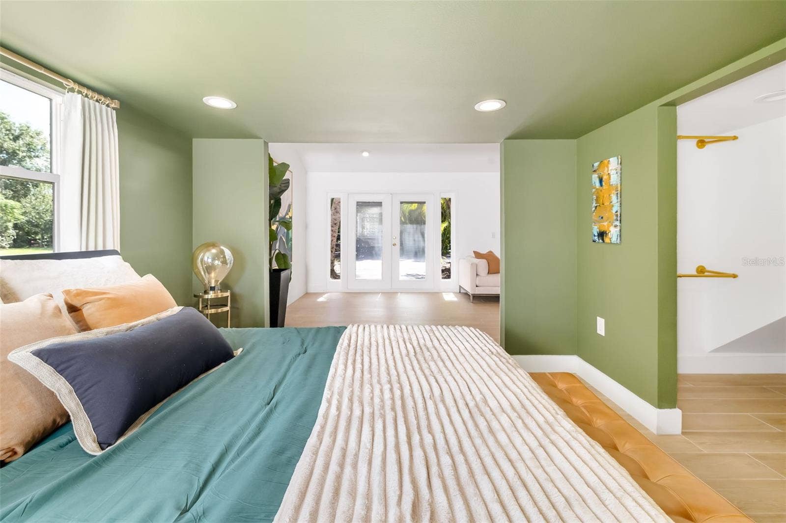 403 LONGBOW TRAIL, Osprey, FL 34229 Generously sized bedroom within the flexible guest/in-law-style living area, offering privacy and comfortable space for extended stays.
