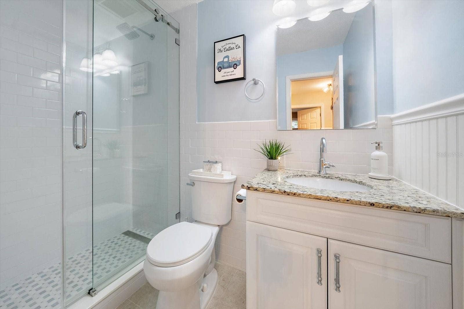 full bathroom, utilized by either the 2nd or 3rd bedroom guests